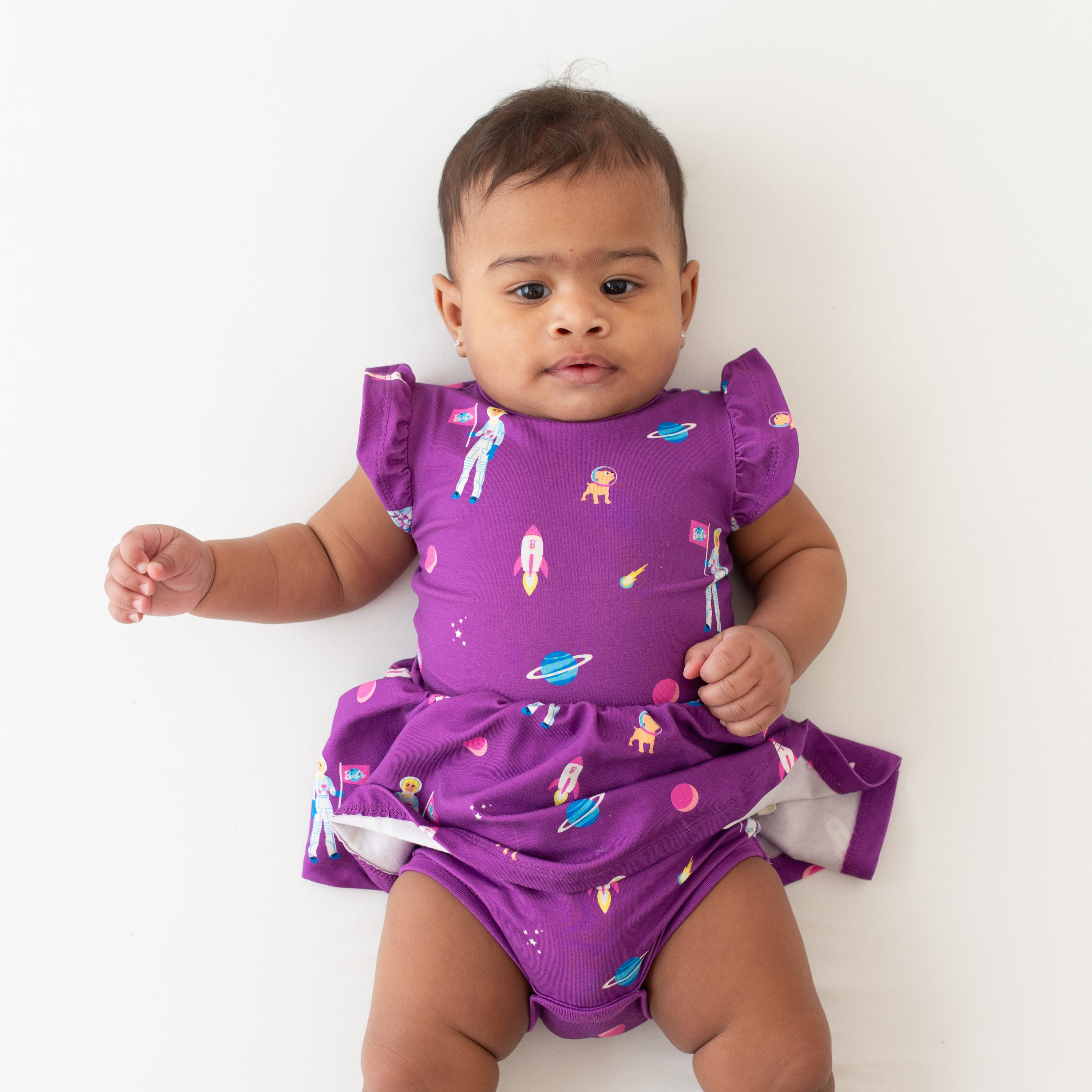 Baby modeling Twirl Bodysuit Dress in Barbie™ Astronaut