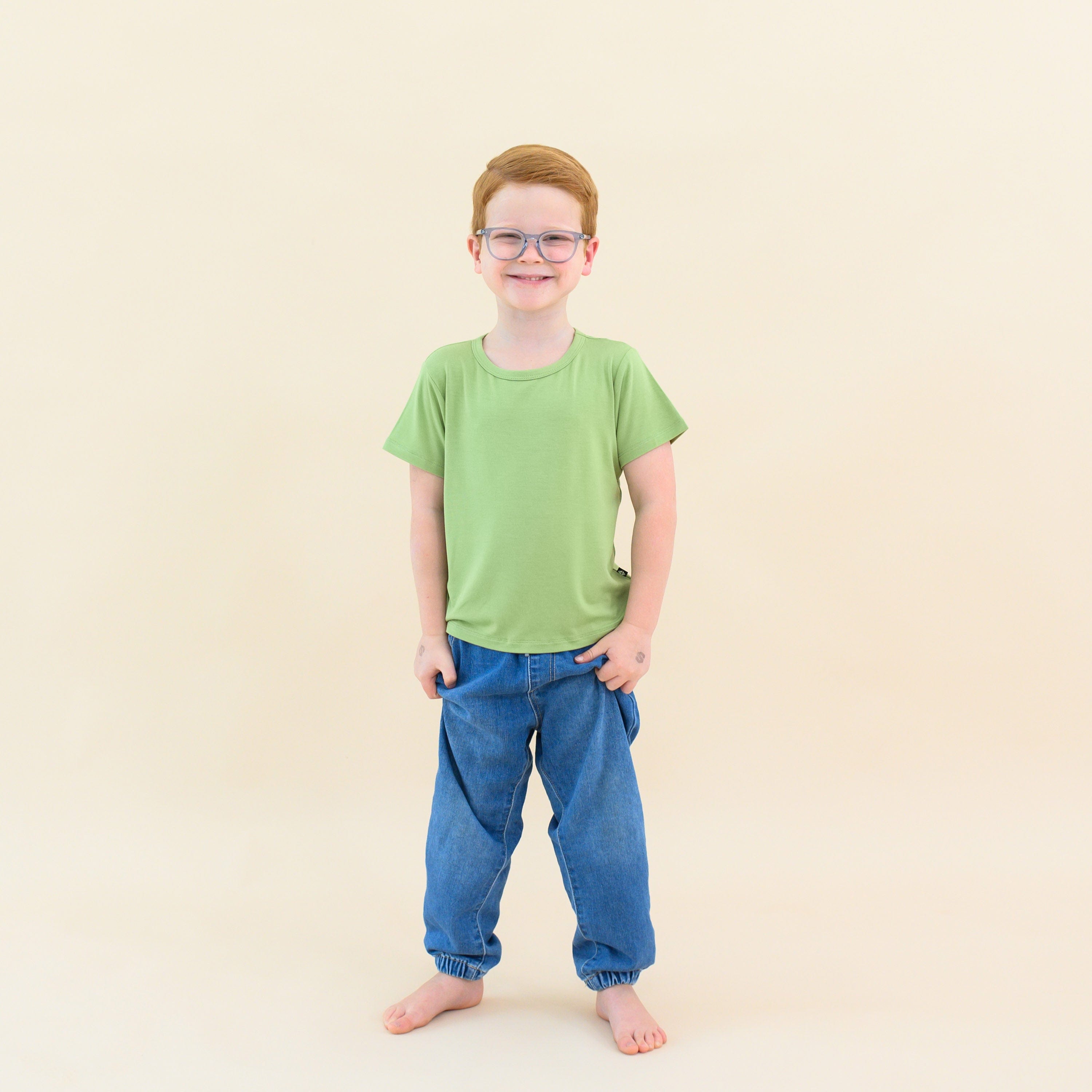 toddler modeling basic tee in honu