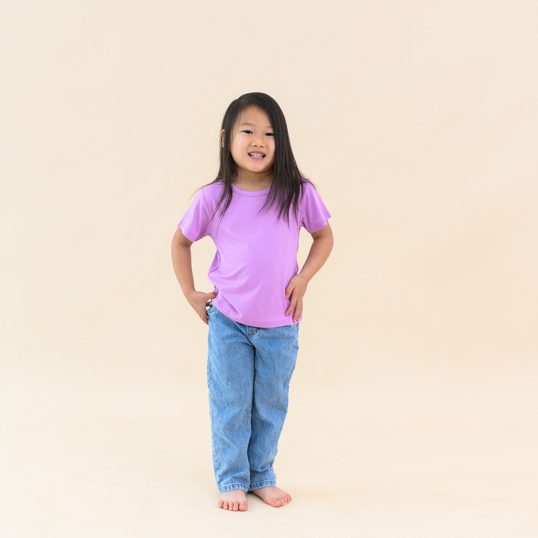 toddler modeling basic tee in poi