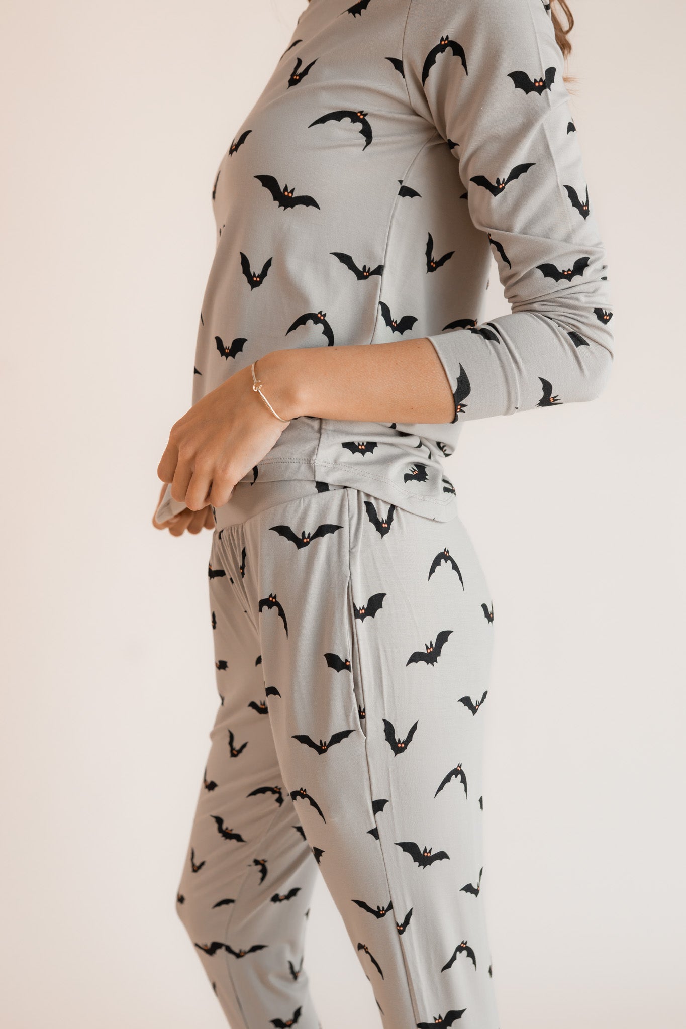 Close up of Modal wearing Women's Jogger Pajama Set in Bats print on a white background