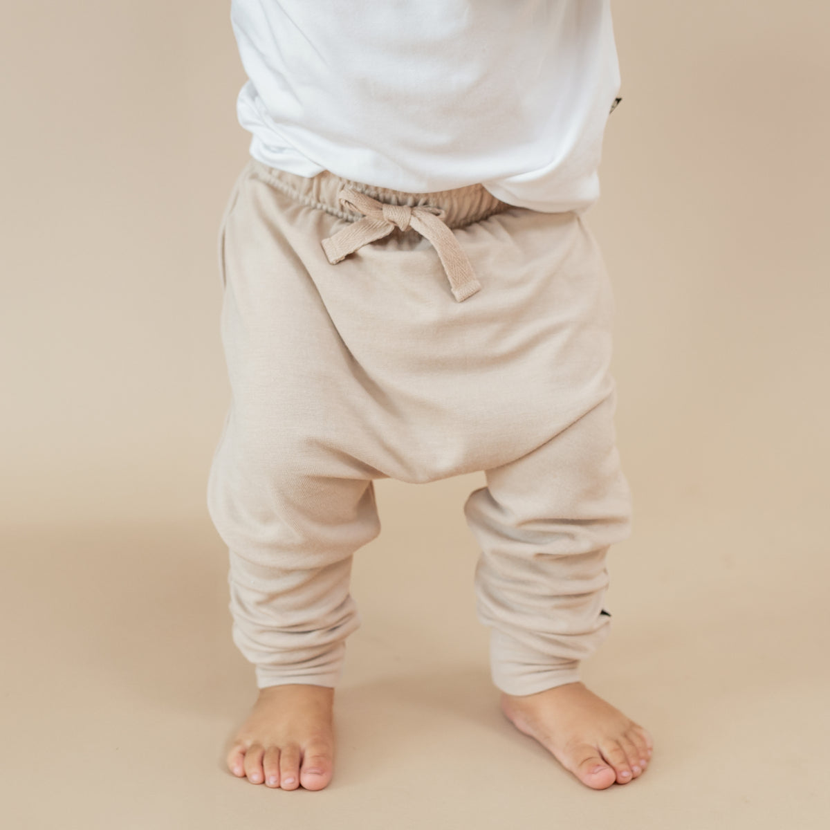 Bamboo Jersey Harem Pants in Bisque shown on a toddler model