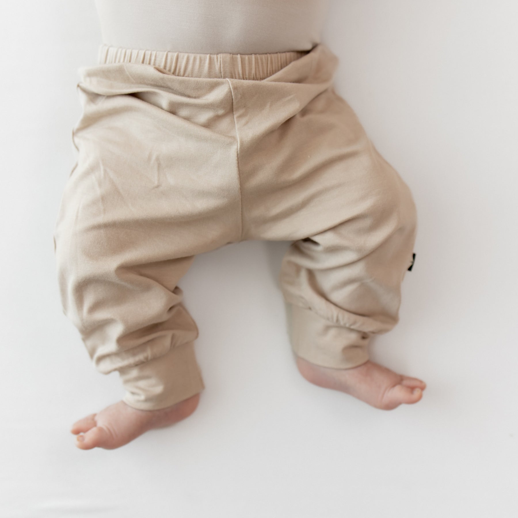Close up of the Pant in Bisque on an infant