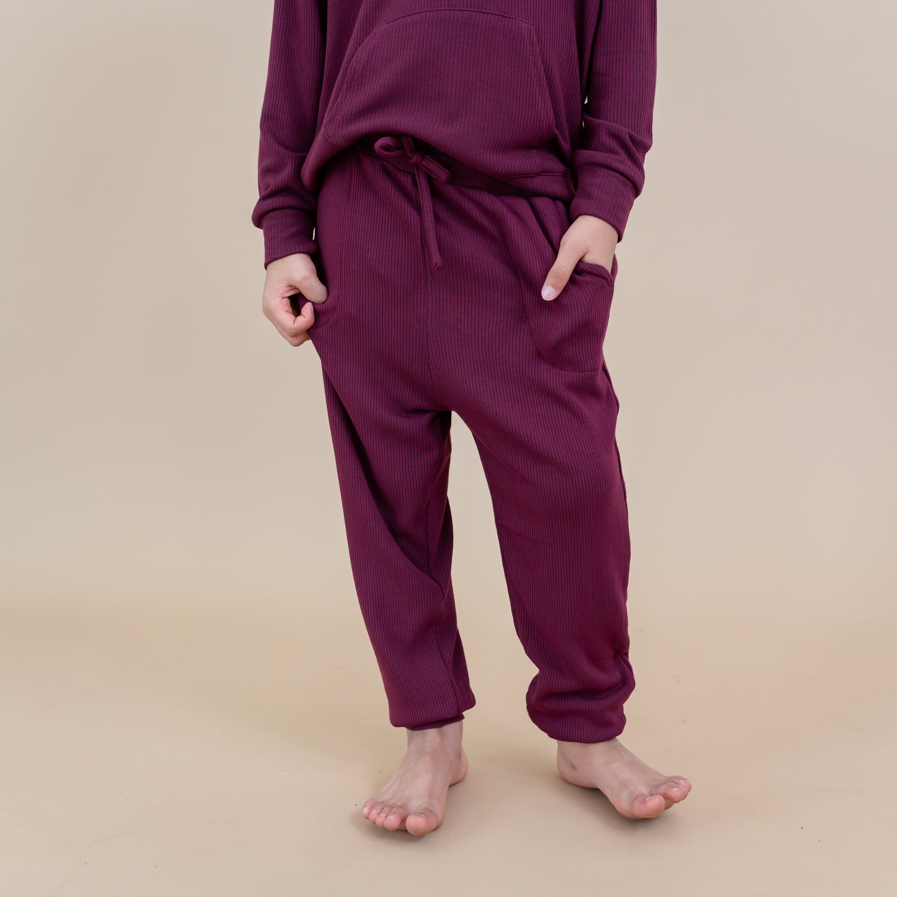 Ribbed Jogger Pant in Burgundy shown on a model