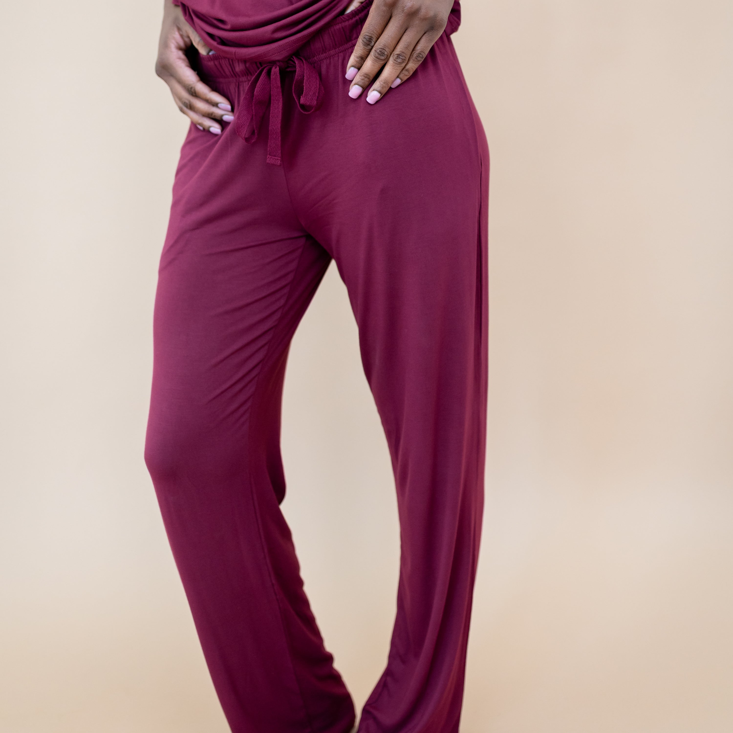 Close up of the Women's Lounge Pants in Burgundy on a model