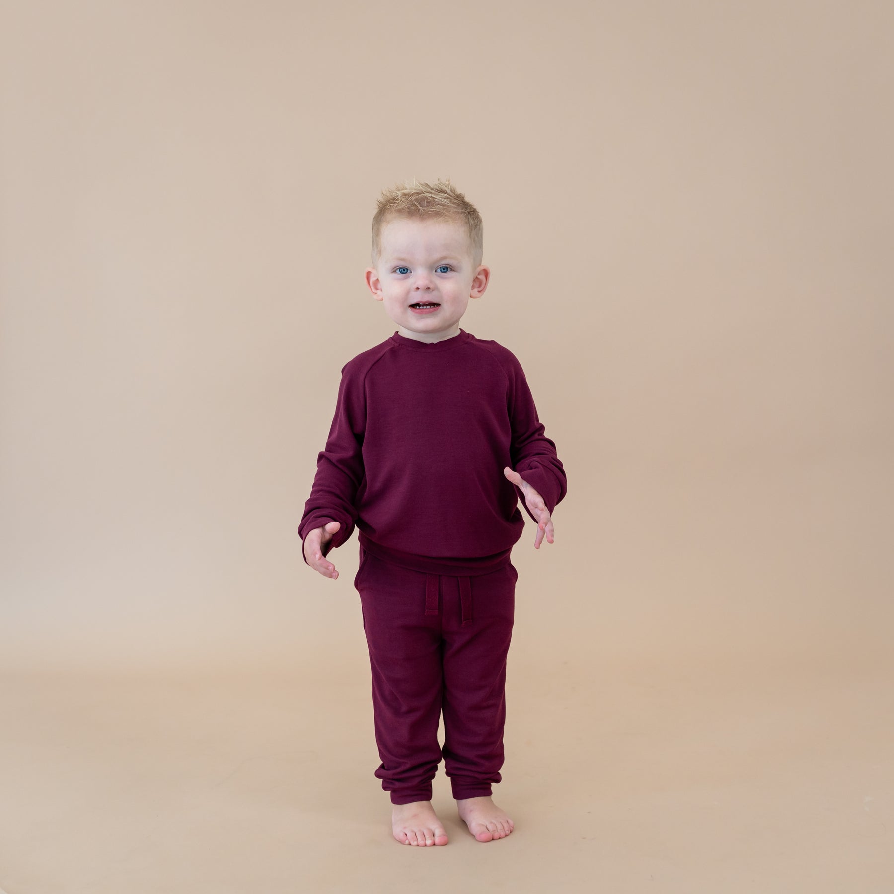 Toddler wearing the Bamboo Jersey Two-piece Jogger pajamas set in Burgundy