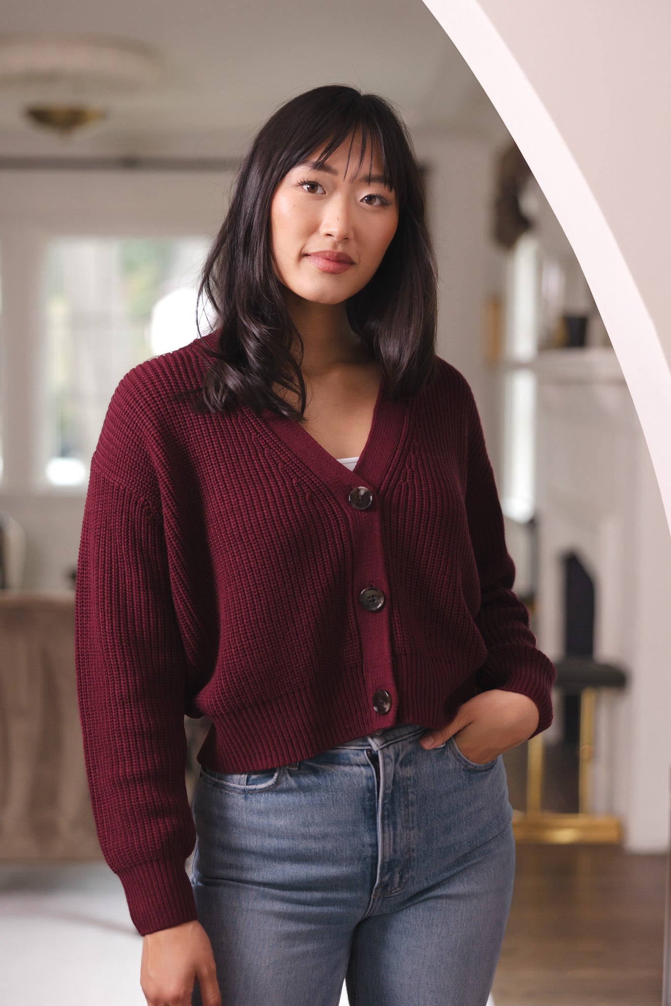 Modal wearing Chunky Knit Women's Cropped Cardigan in Burgundy