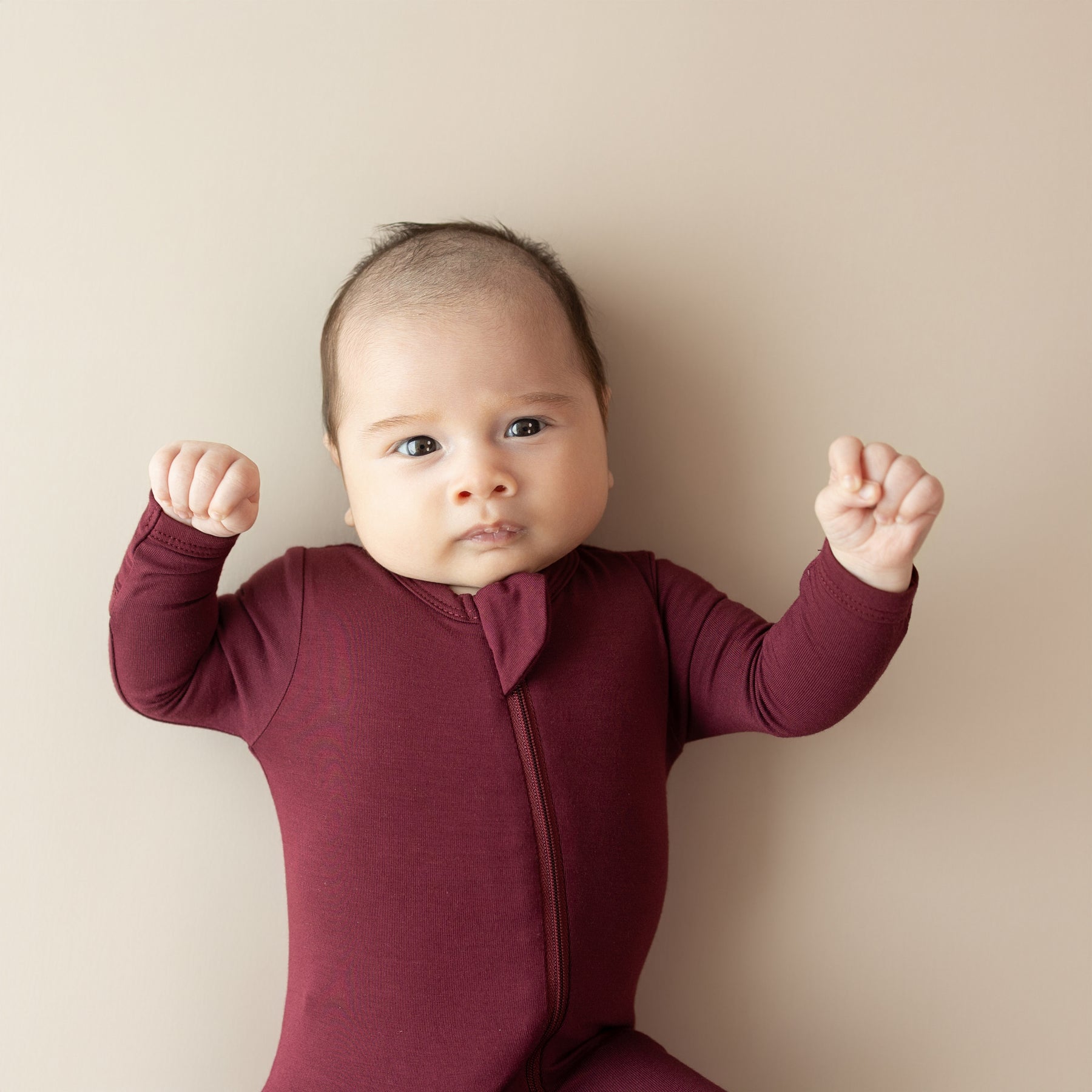 Zippered red footie pajamas in Burgundy