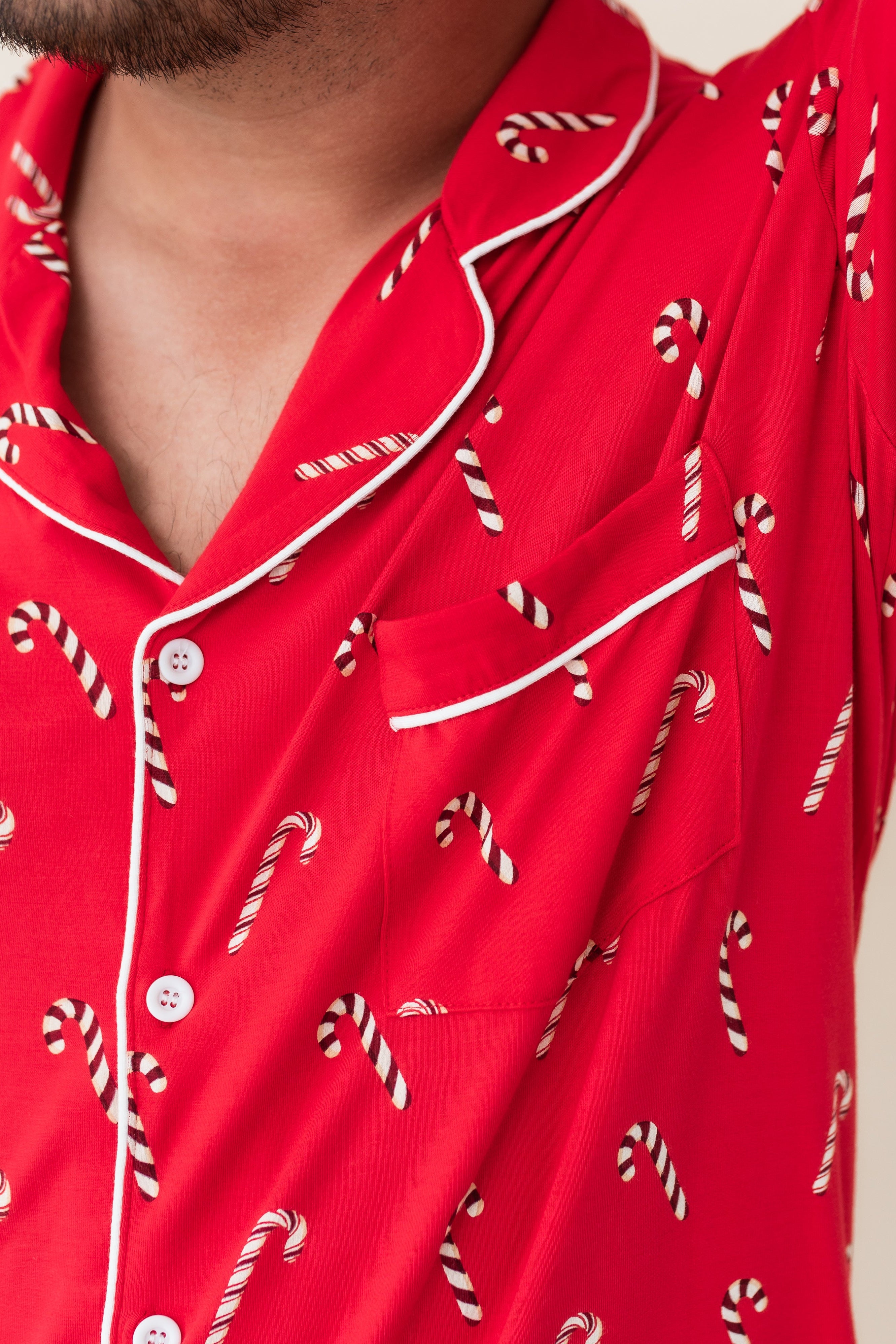 Close up of the chest pocked detail on the Men's Long Sleeve Pajama Set in Candy Cane