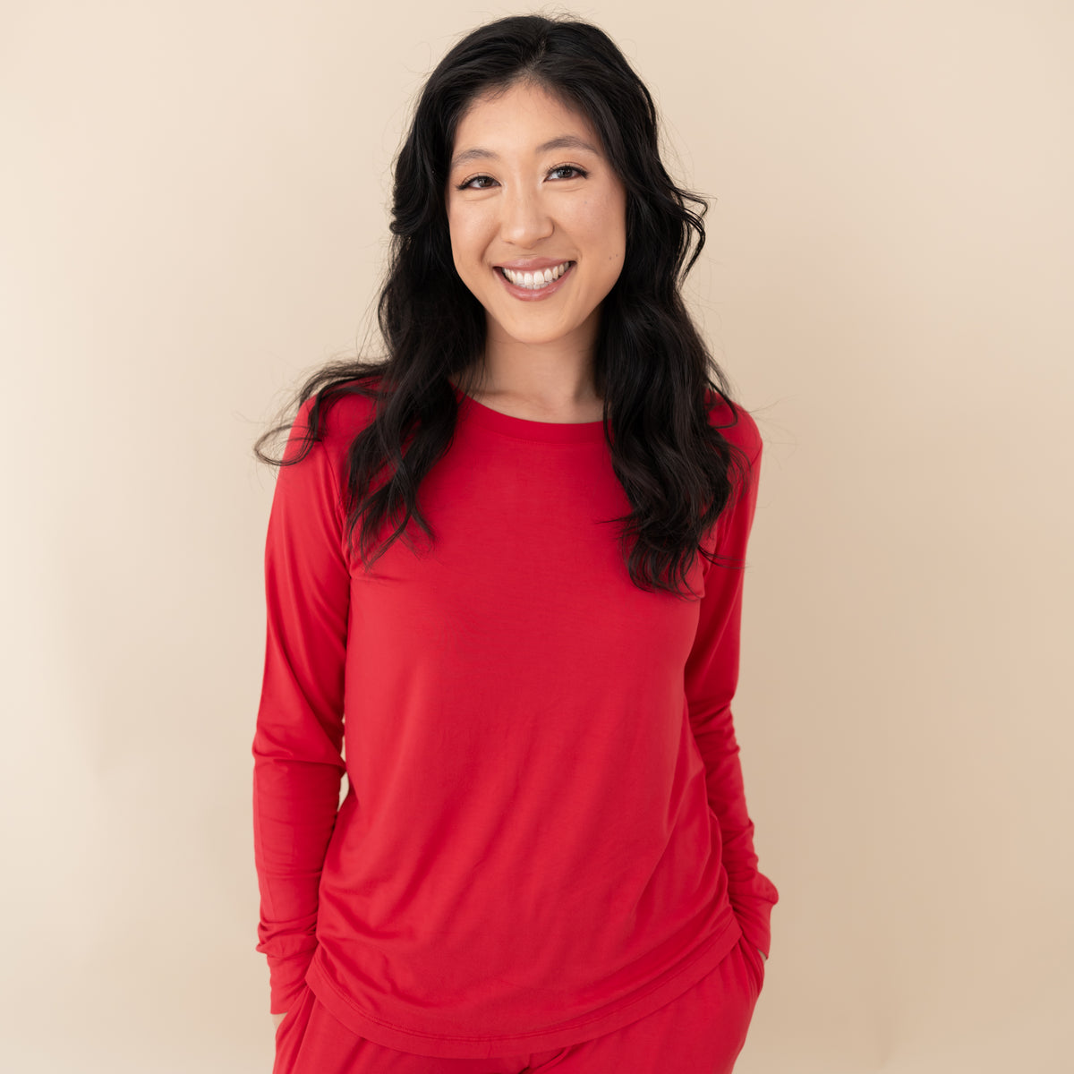 Woman modeling Women's Jogger Pajama Set in Cardinal close up on top