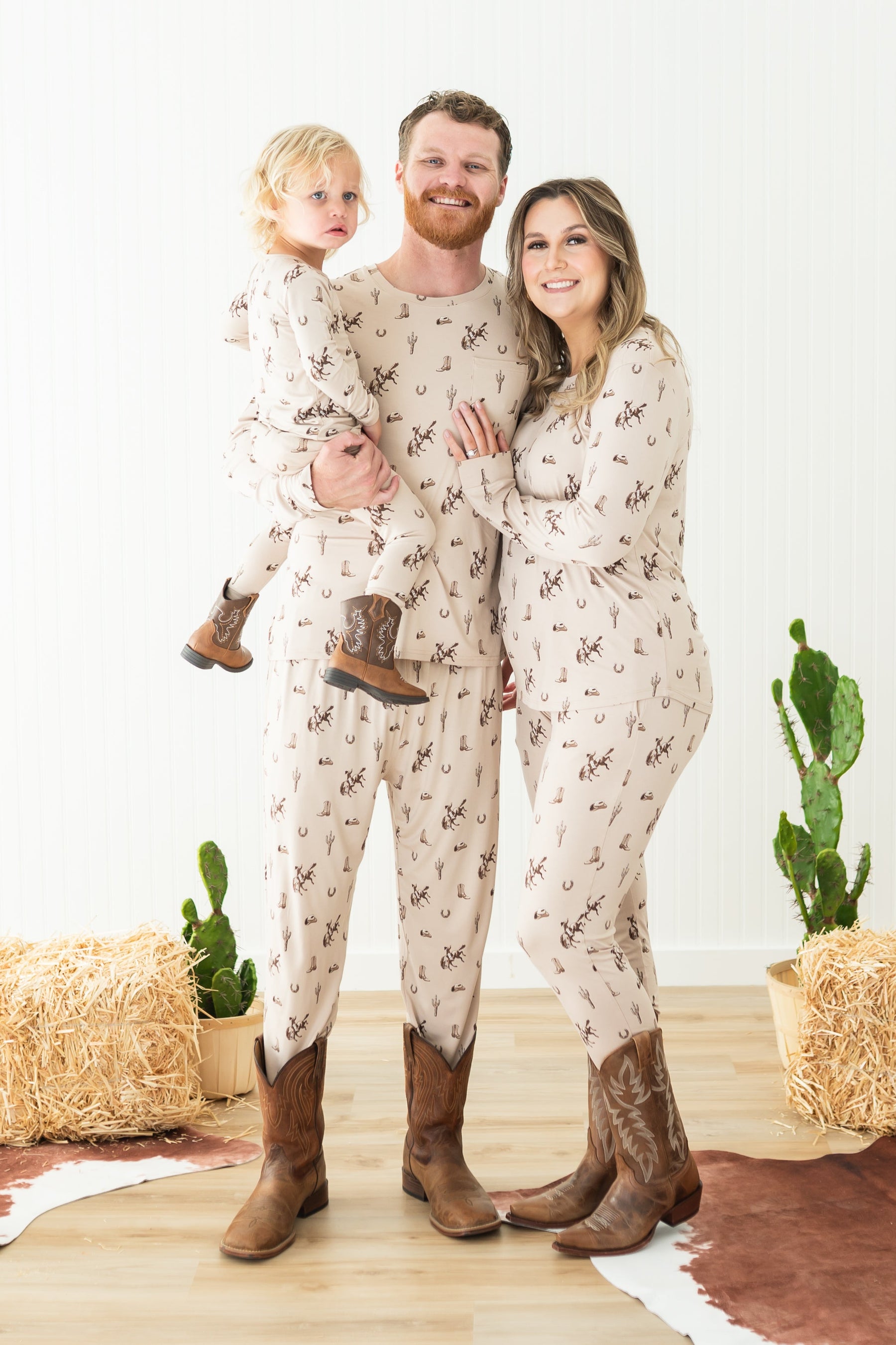 Family of three matching in Classic cowboy pajamas