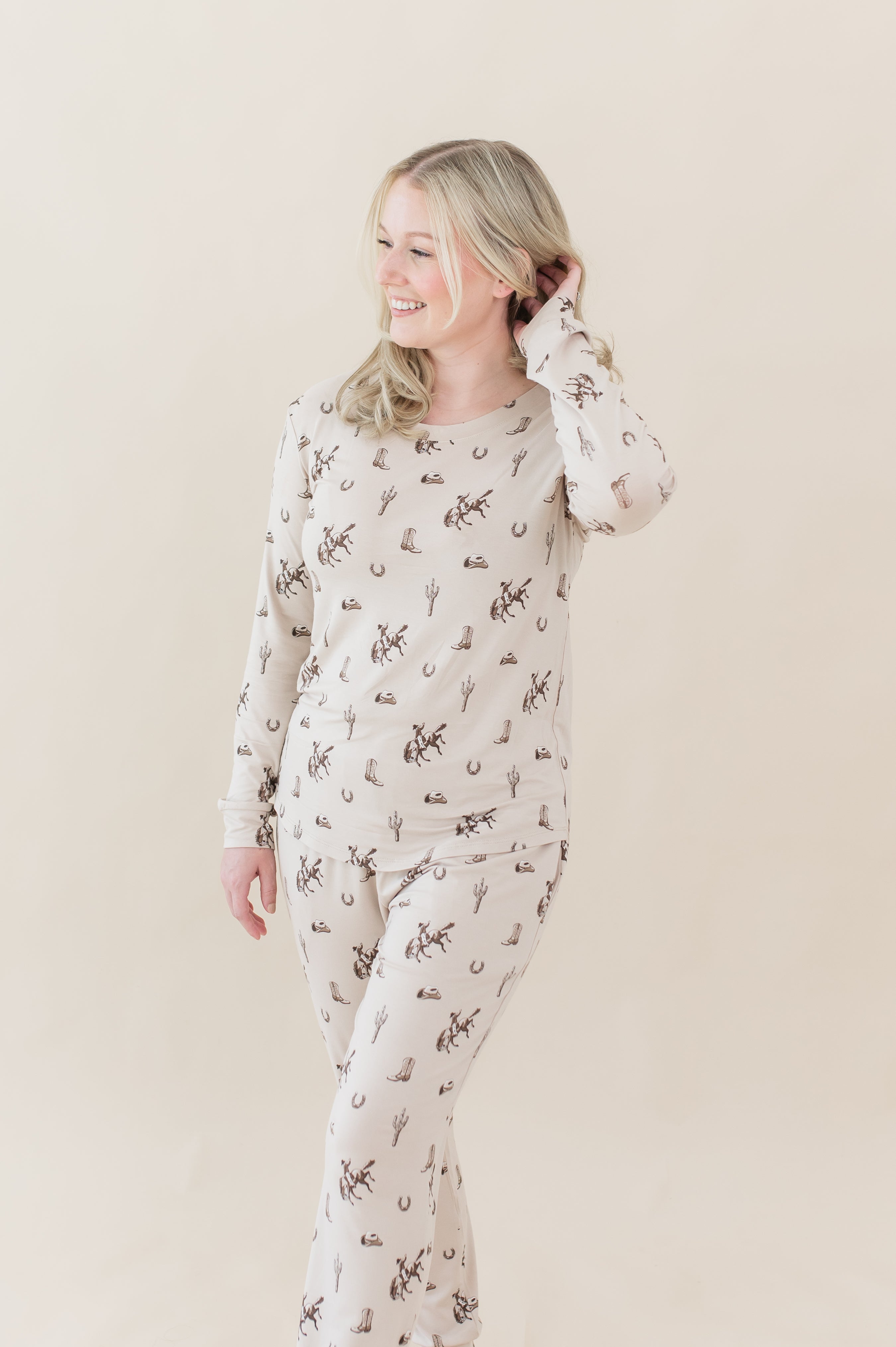 Female posing wearing the Women's Jogger Pajama Set in Classic Cowboy in front of a light neutral background