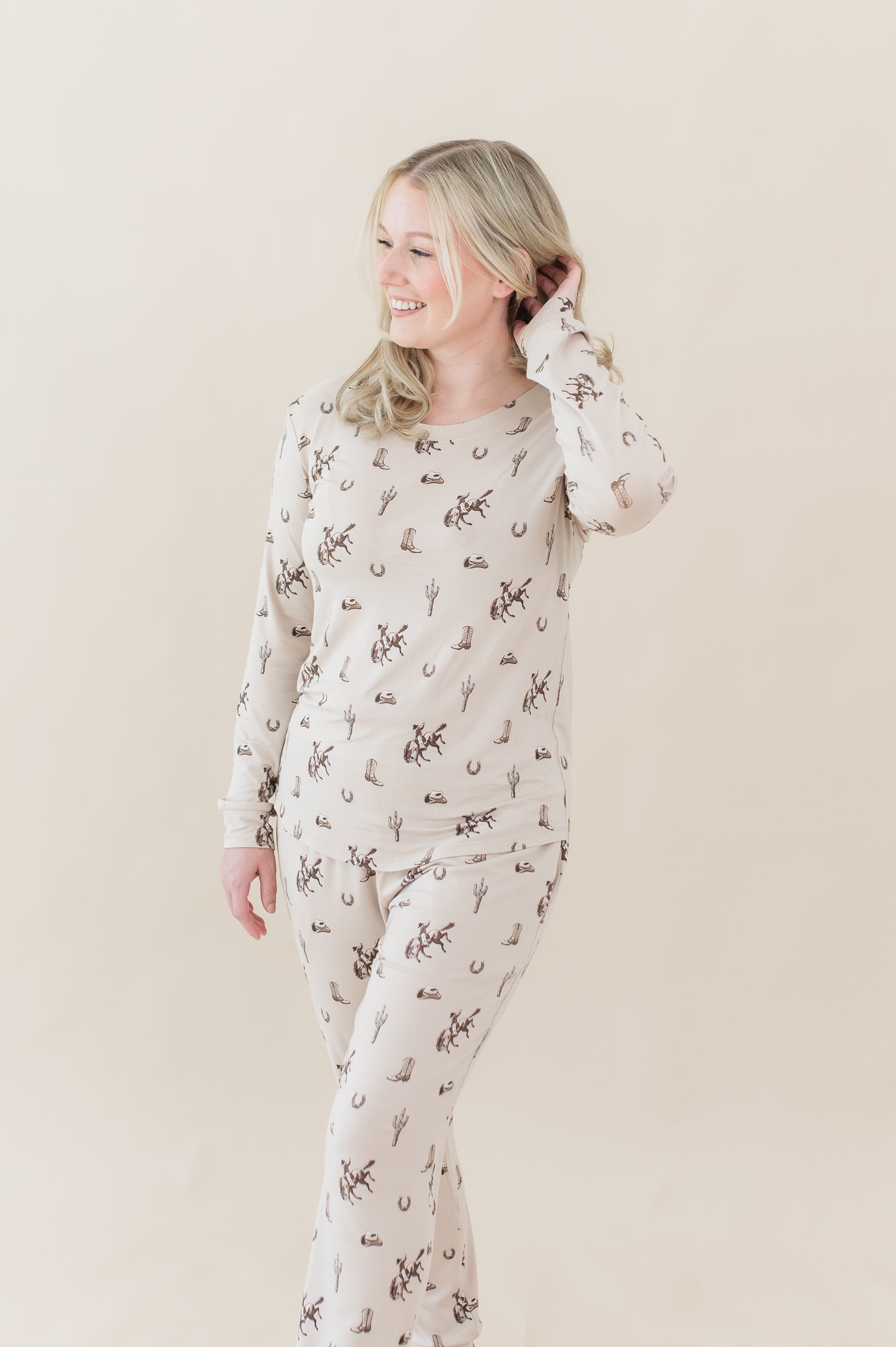 Female posing wearing the Women's Jogger Pajama Set in Classic Cowboy in front of a light neutral background