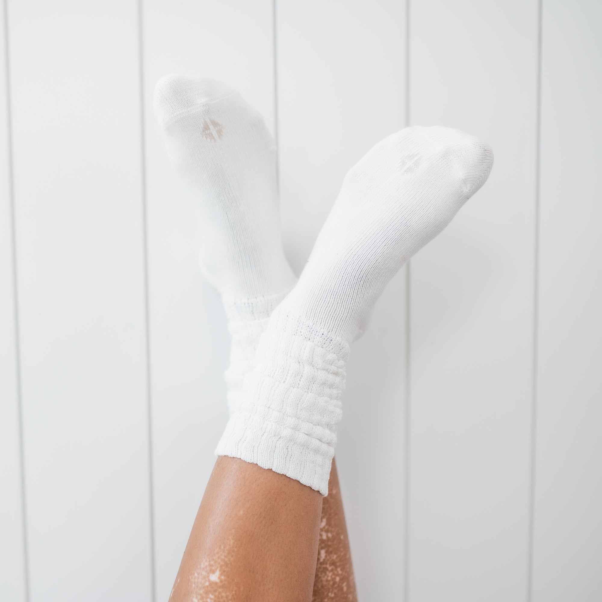 Adult Scrunch Socks in Cloud shown on a model