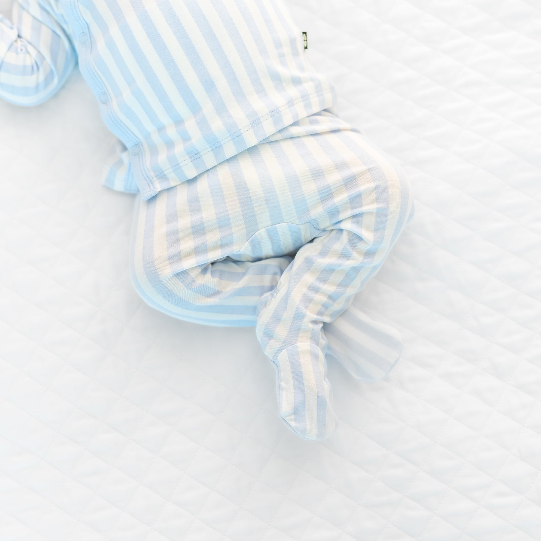 Close up of the pants of the Take Me Home Set with Cap in Small Mist Stripe