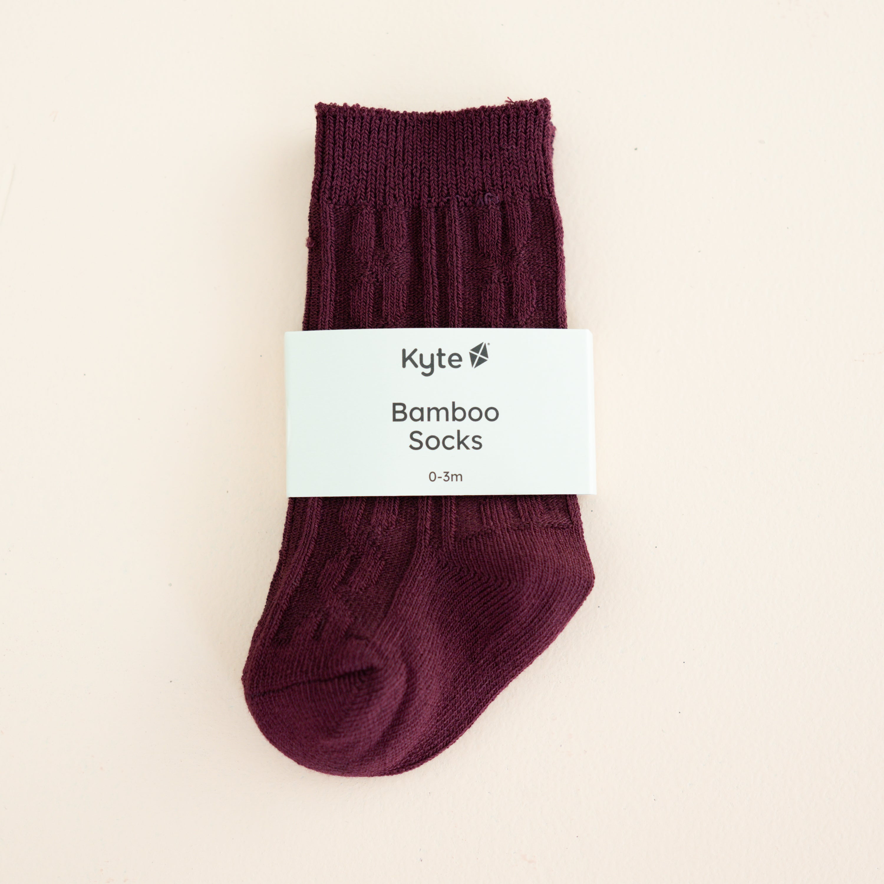 Knee High Socks in Burgundy shown in its packaging