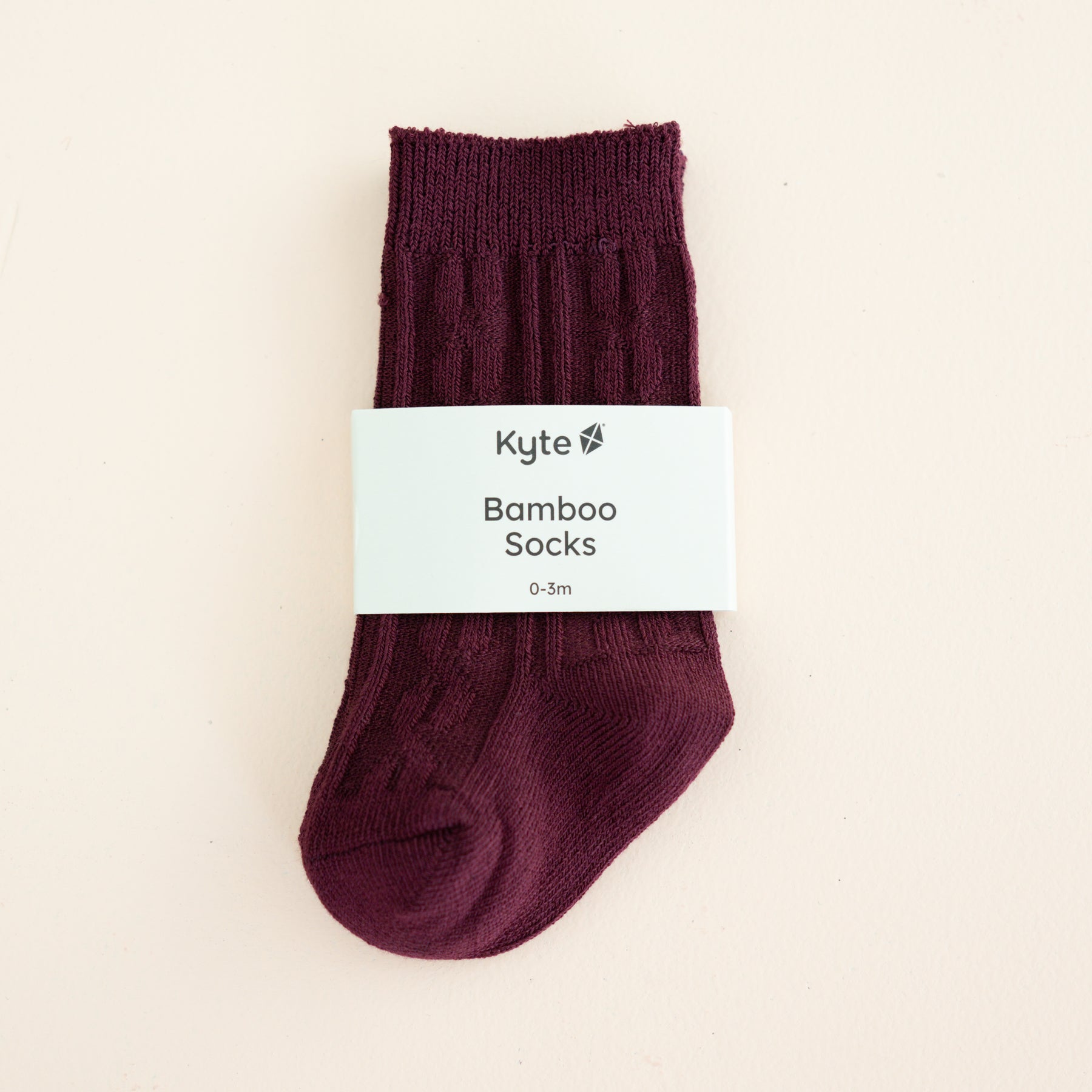 Knee High Socks in Burgundy shown in its packaging