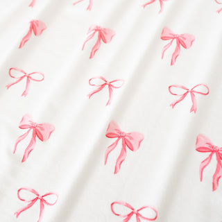 Close up of bow fabric pattern from Lulla Babys