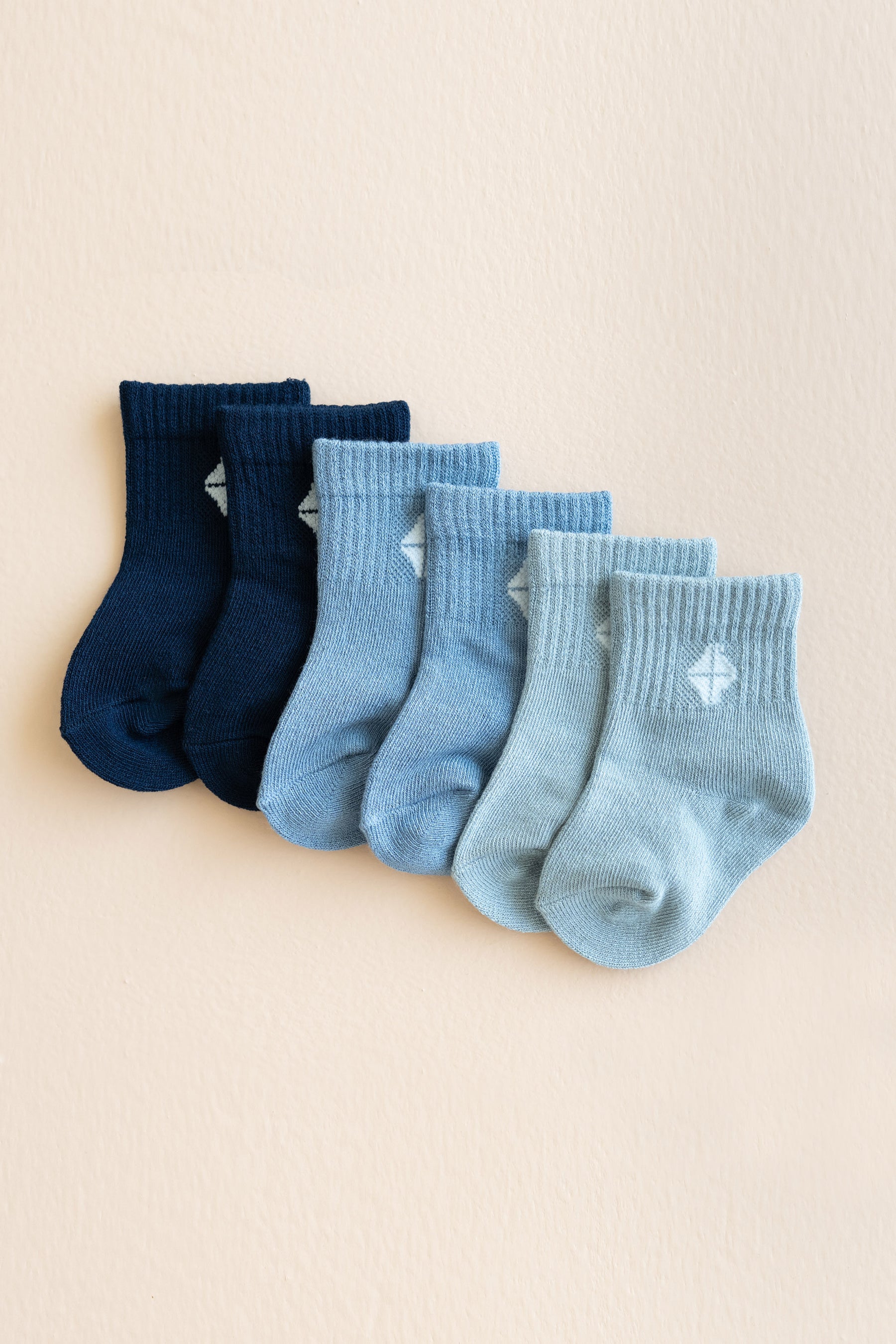 Flat lay in the Crew Socks Combo 3-Pack in Cool showing colors Navy, Slate and Fog