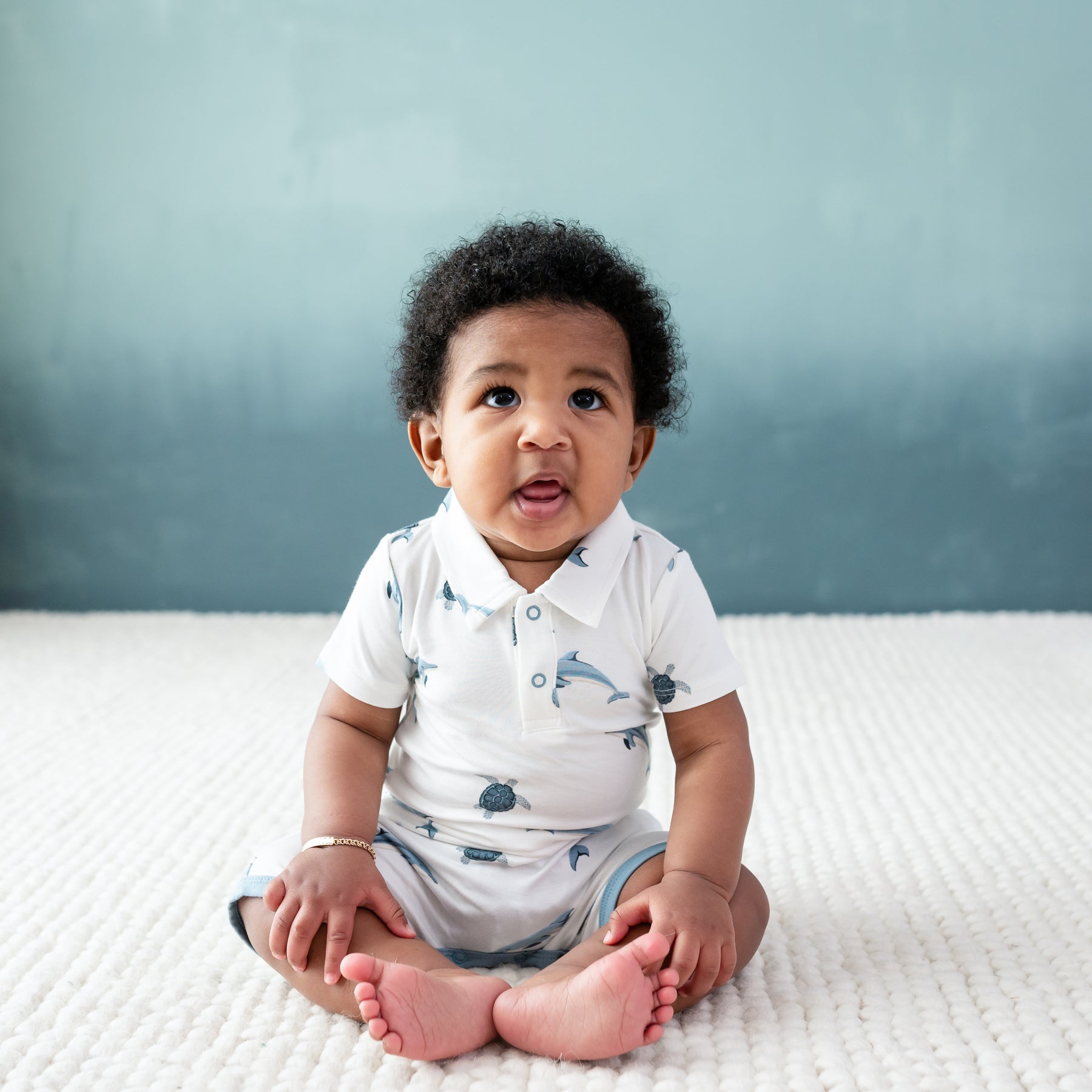 Baby modeling Polo Shortall in Dolphin