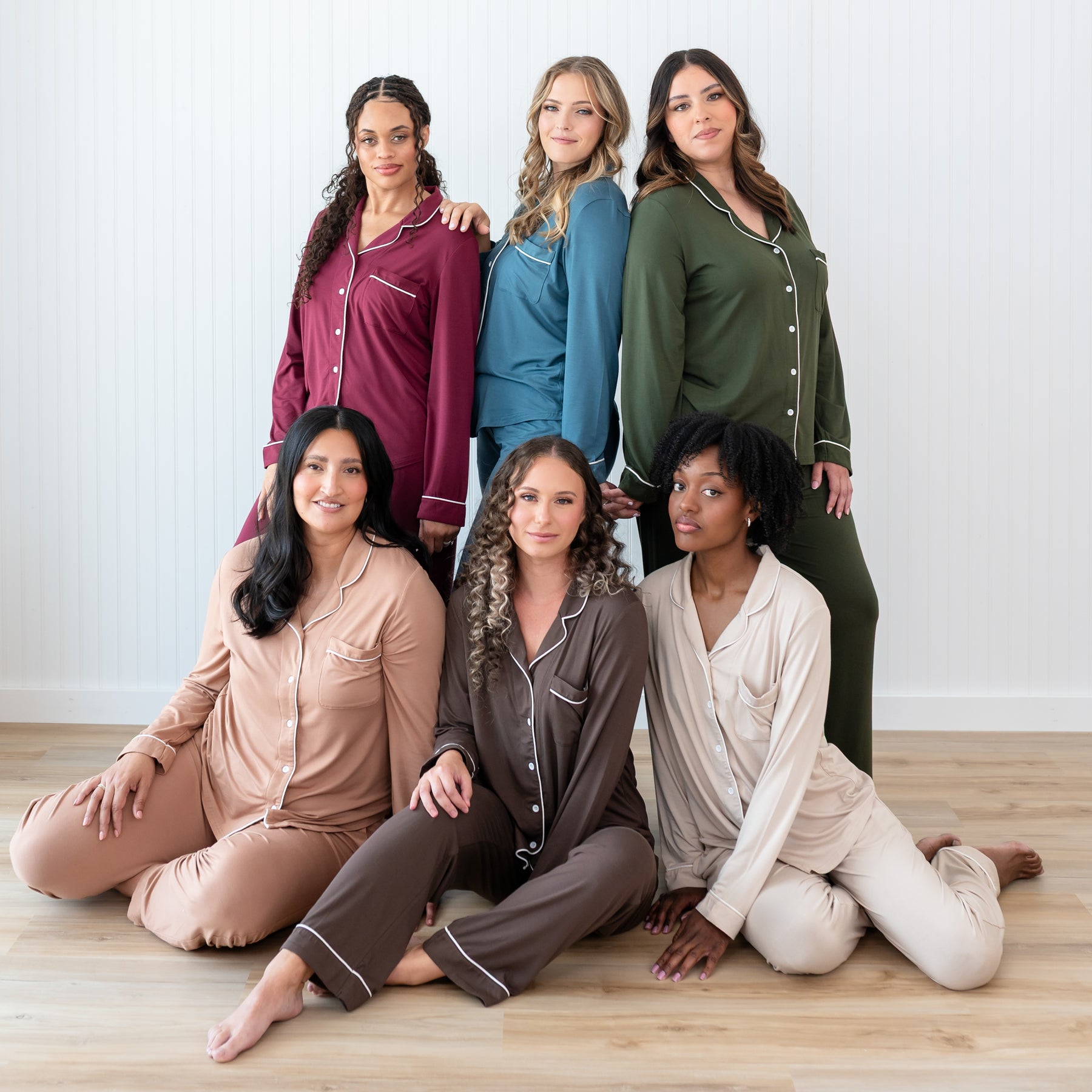 6 female models wearing the Long-Sleeved Women's Pajama Set in Fall colors