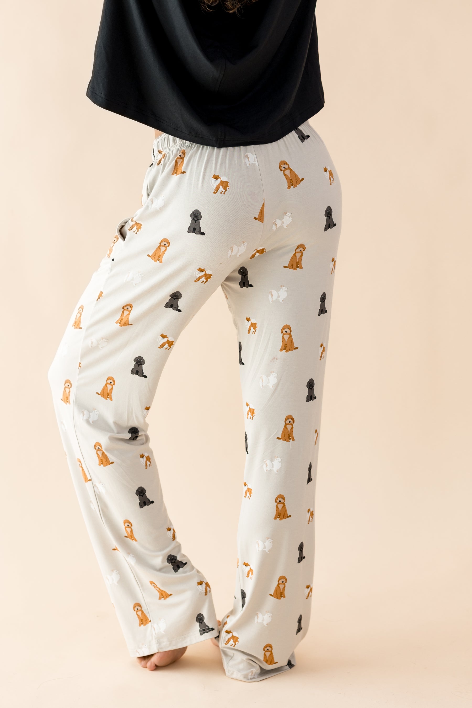 The back of the Women's Lounge Pants in Fluffy Dog shown on a female model