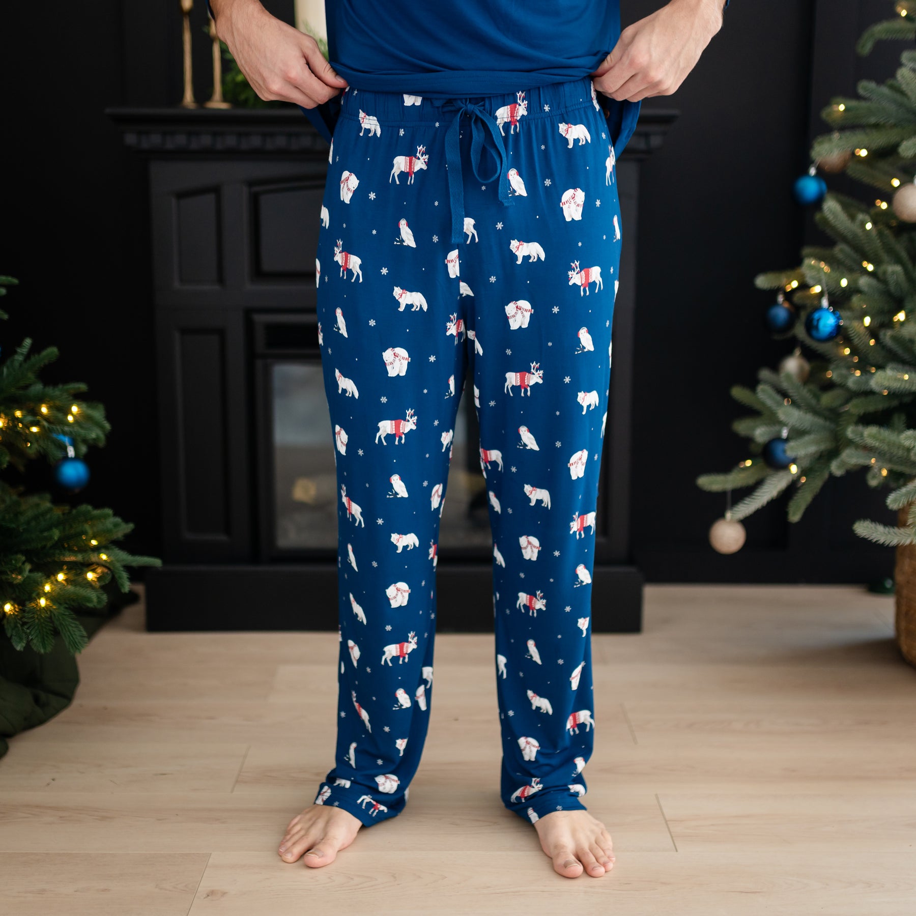 Men's Lounge Pants in Frosty Friends shown on a male model