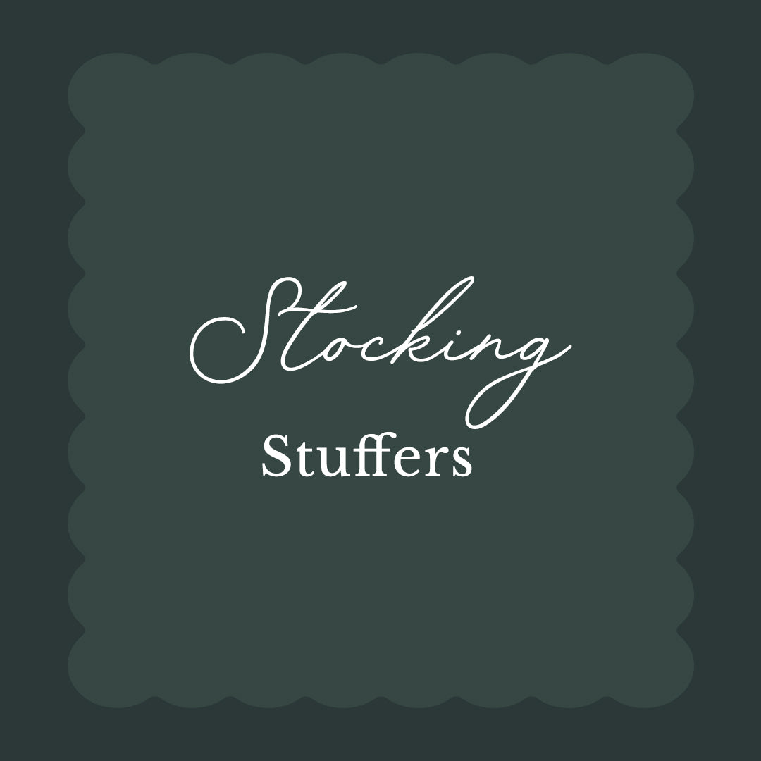 A dark green square graphic with scalloped edges and white text reading 'Stocking Stuffers' on a dark background.