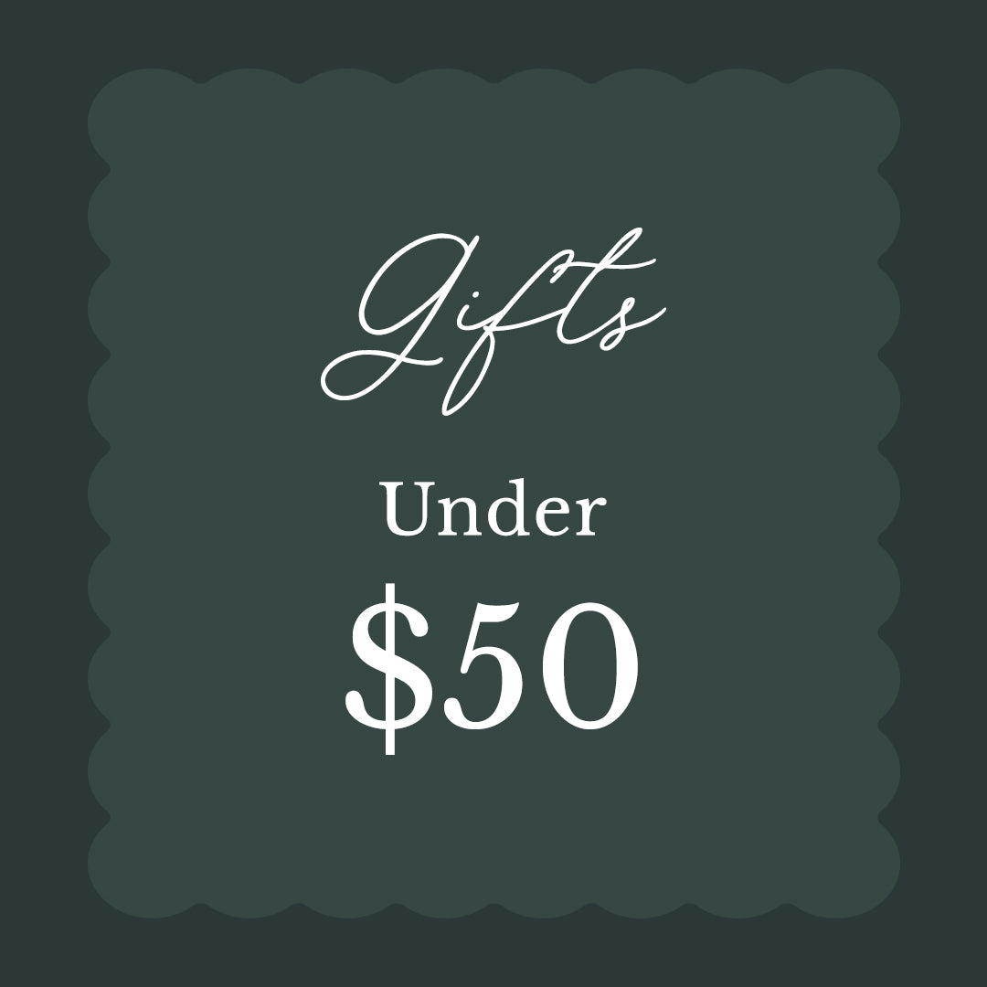 A square gift card style graphic with scalloped edges on a dark green background, featuring white text that reads 'Gifts Under $50'.