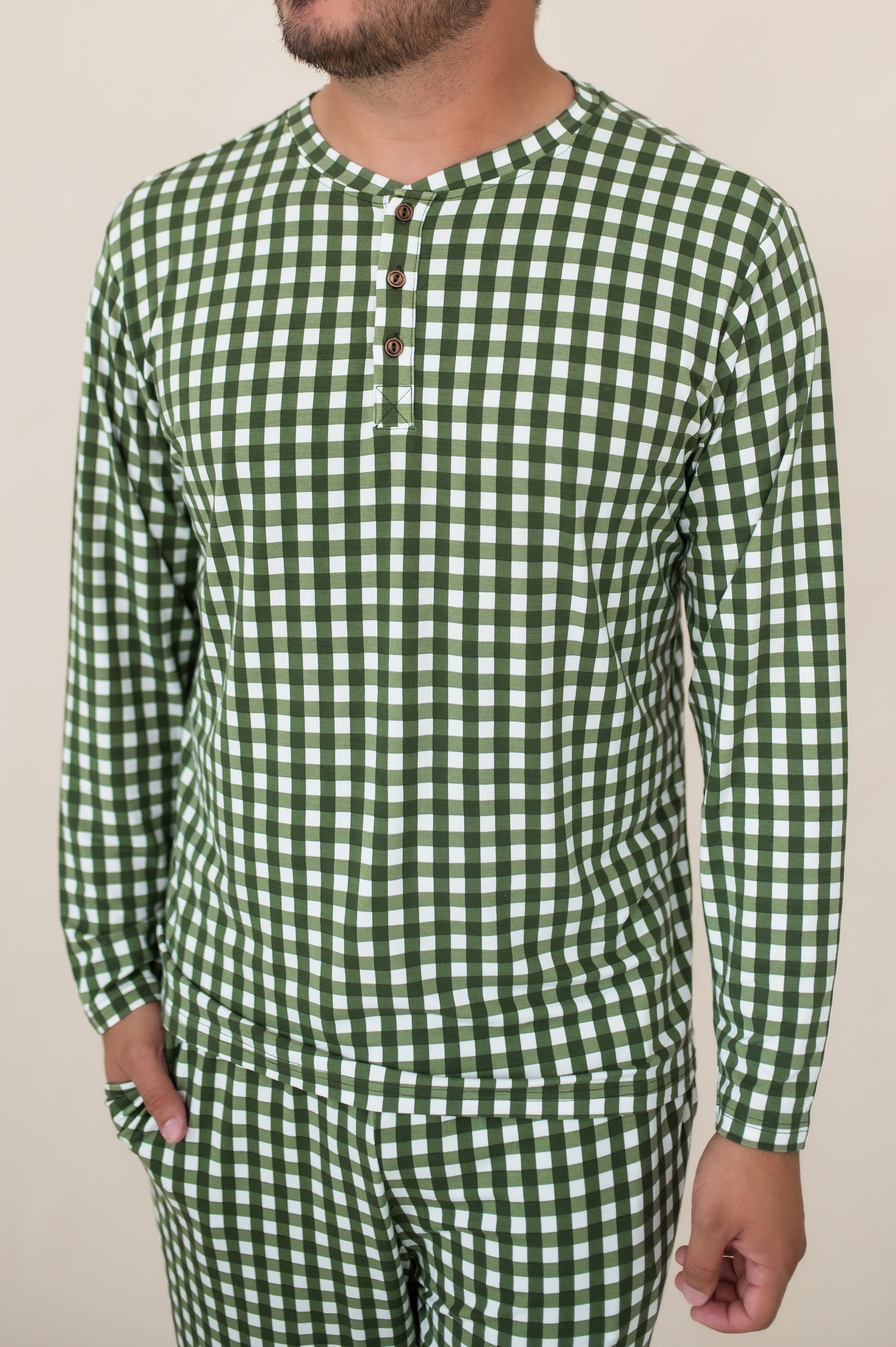 Men's Long Sleeve Henley Top in Gingham Fir shown on a male model