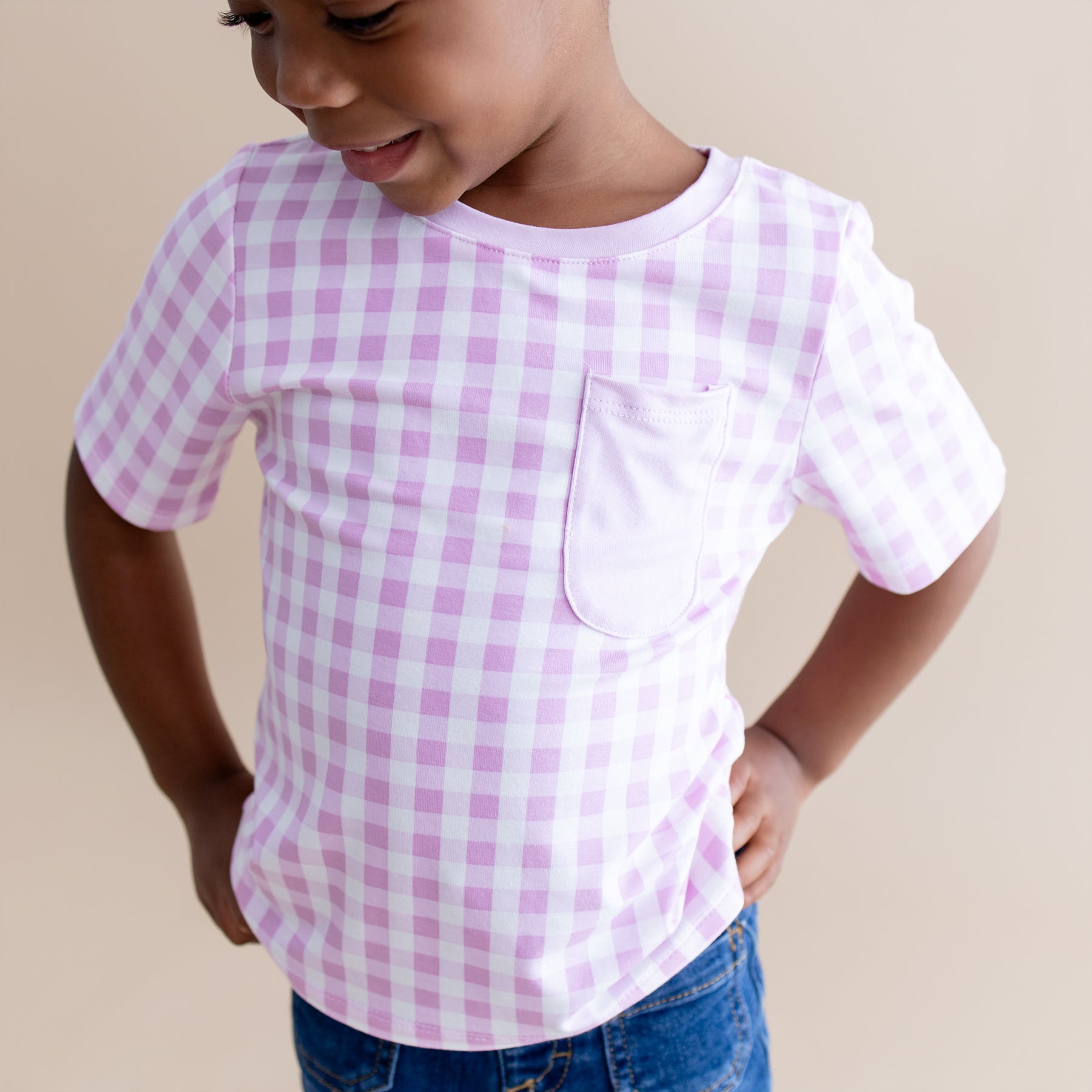 Close up of the Toddler Crew Neck Tee in Gingham Thistle shown on a young girl