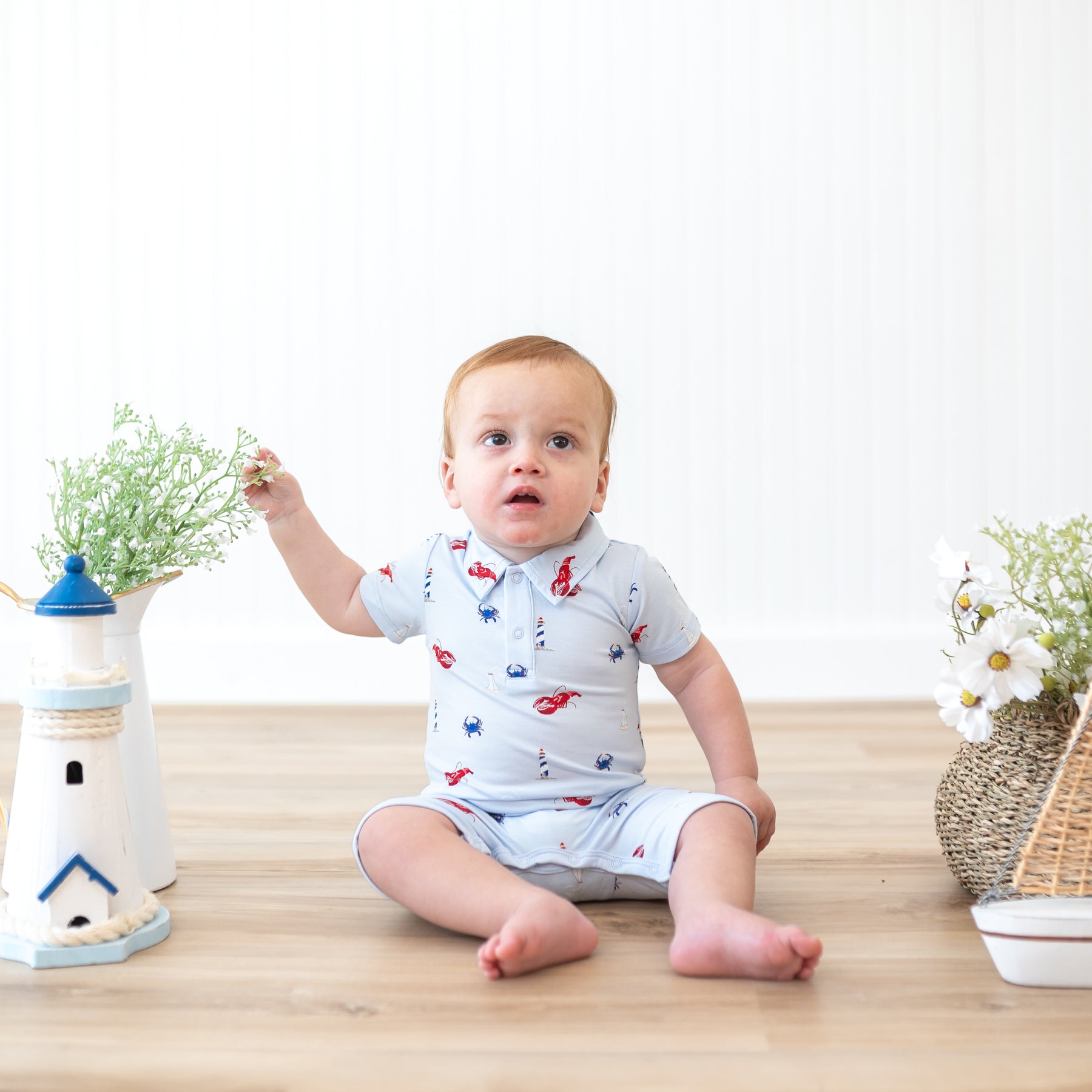 Infant wearing Polo Shortall coastal outfit in Harbor
