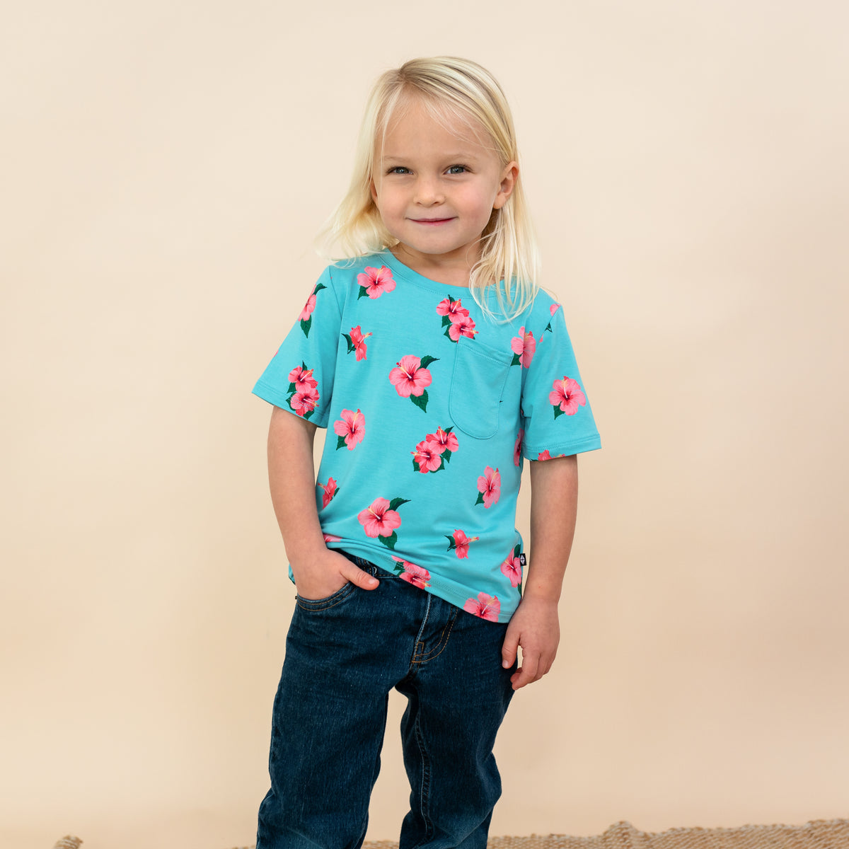 Toddler modeling Kyte Toddler Crew Neck Tee in Hibiscus