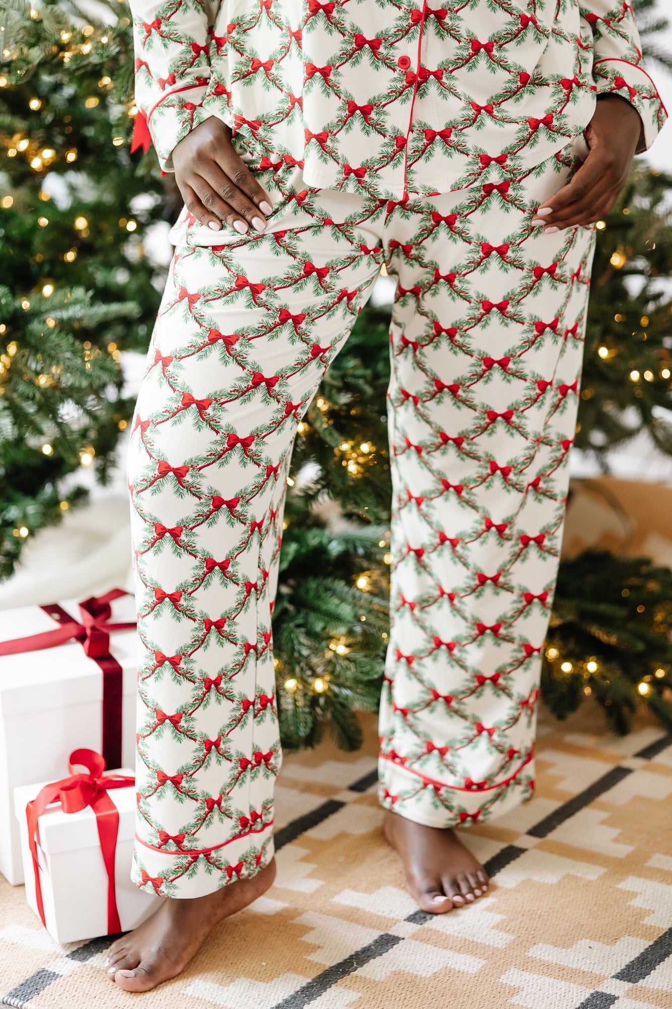 Pants of the Long-Sleeved Women's Pajama Set in Holiday Bow shown on a model