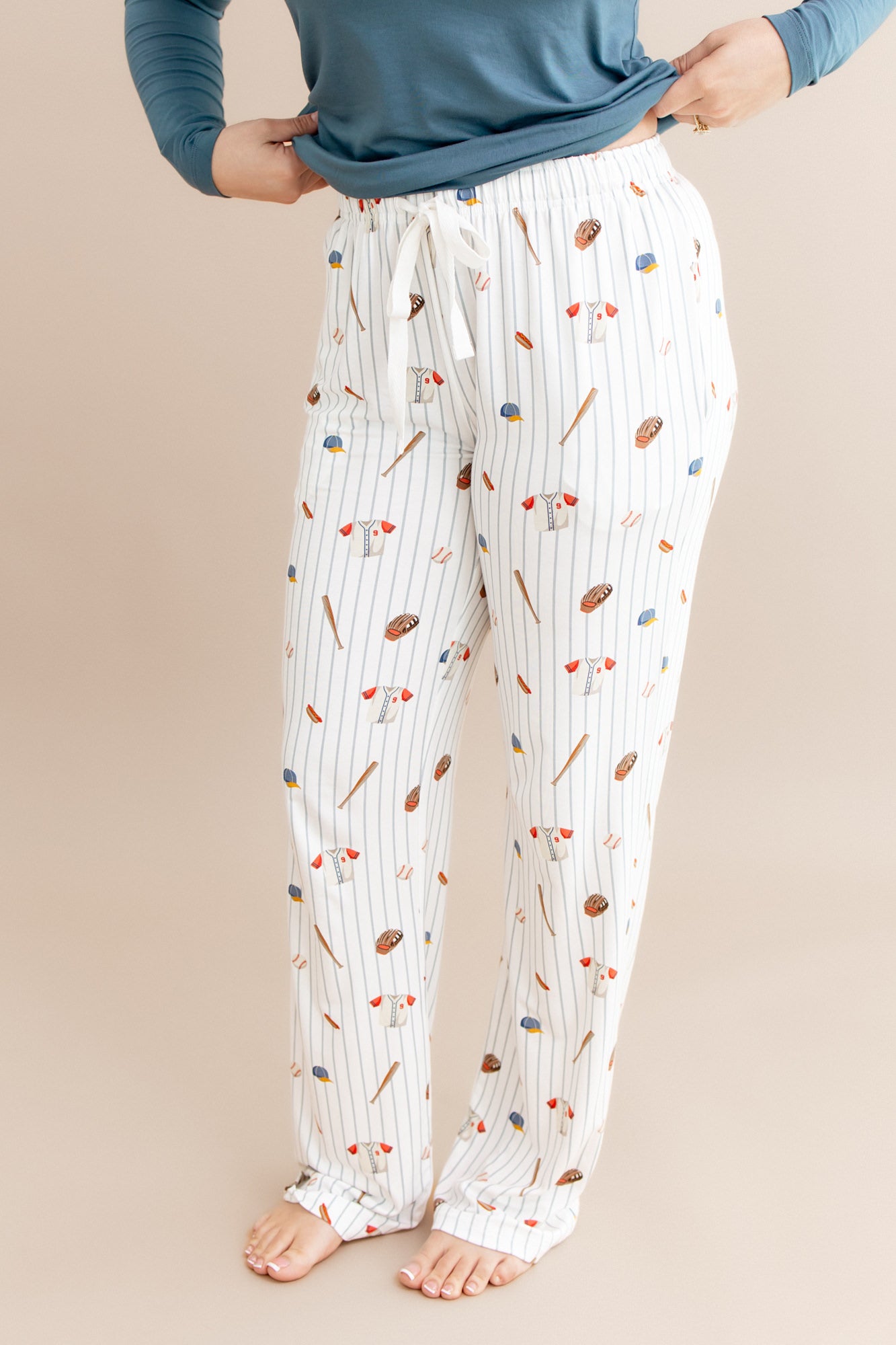 Close up of the Women's Lounge Pants in Home Run shown on a model
