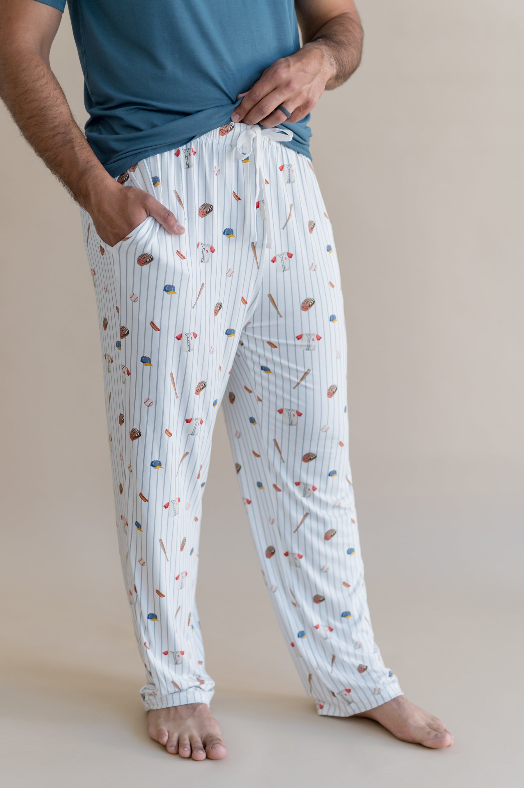 Close up of the drawstring waistband of the Men's Lounge Pants in Home Run on a male model