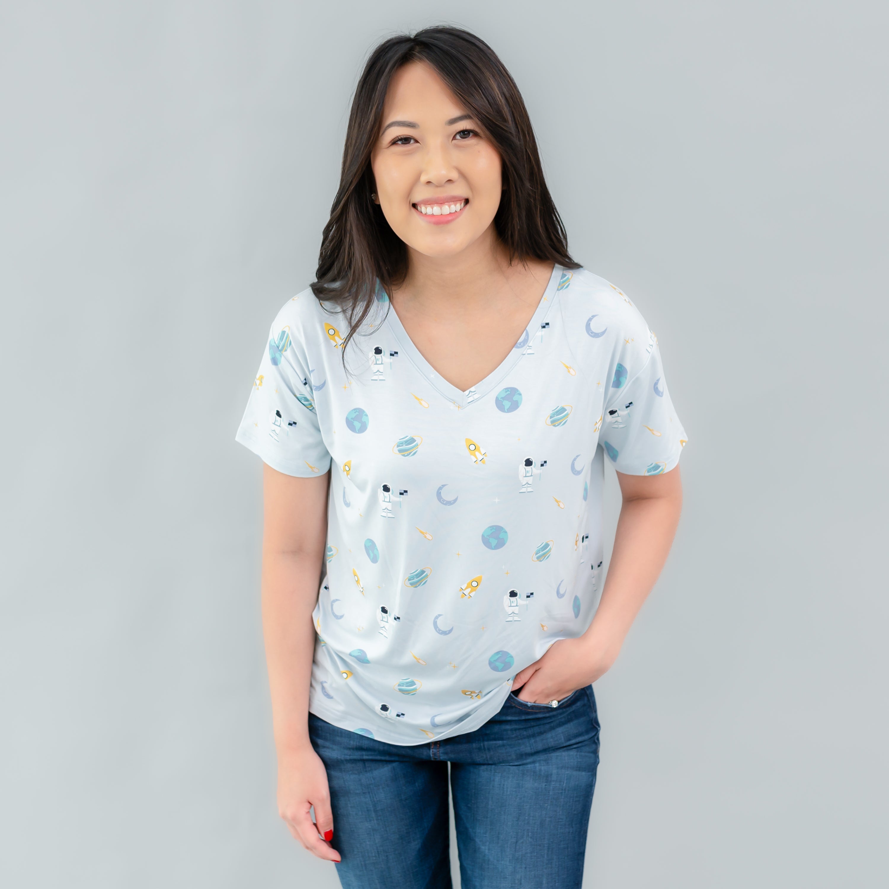 woman smiling wearing ice space relaxed fit v-neck tee