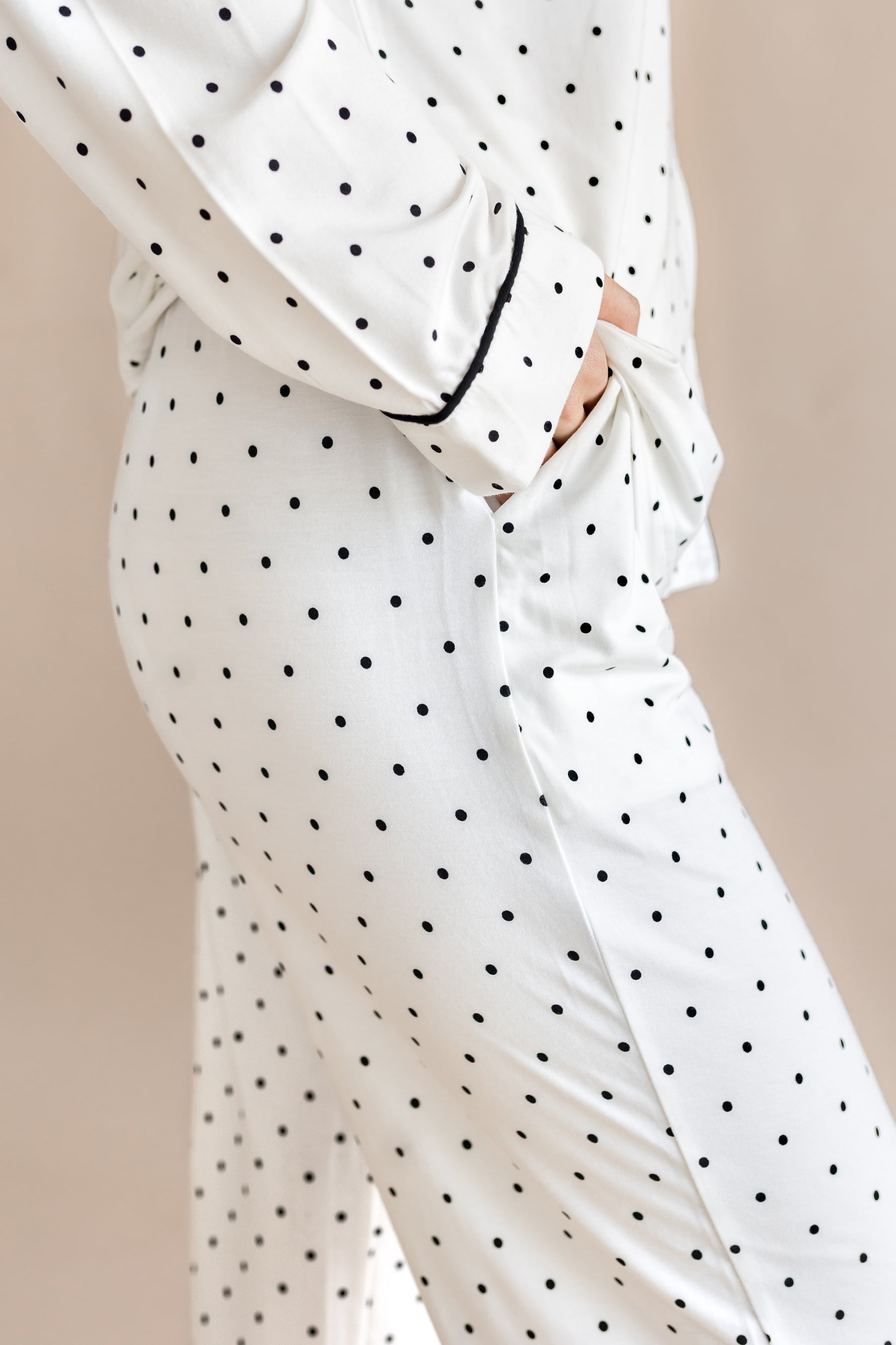 Women's Pajamas with pockets in Midnight Polka Dot print on a beige background