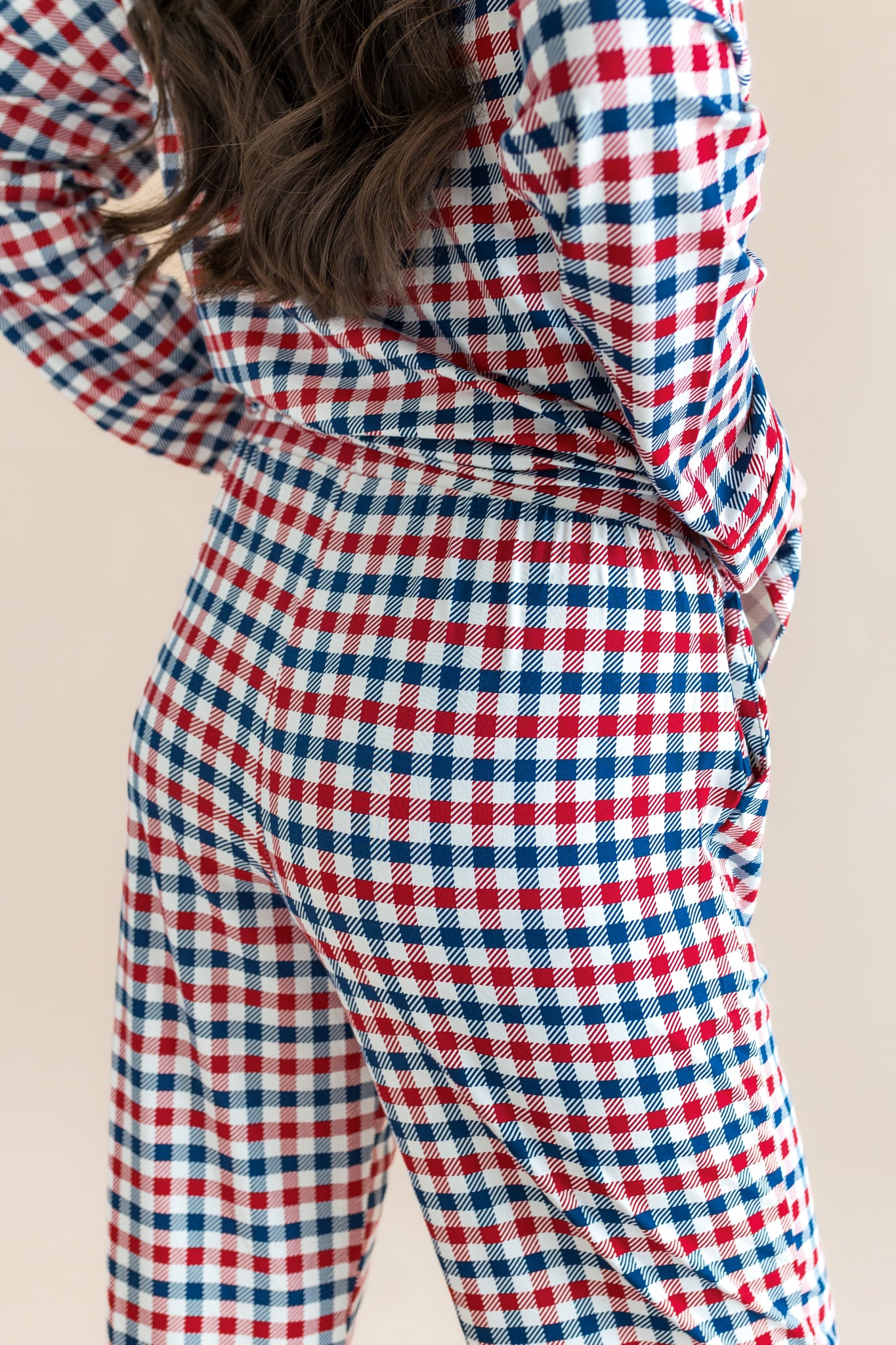 Back side of Women's Pajama Set in red blue and white Patriotic Gingham check print on a beige background