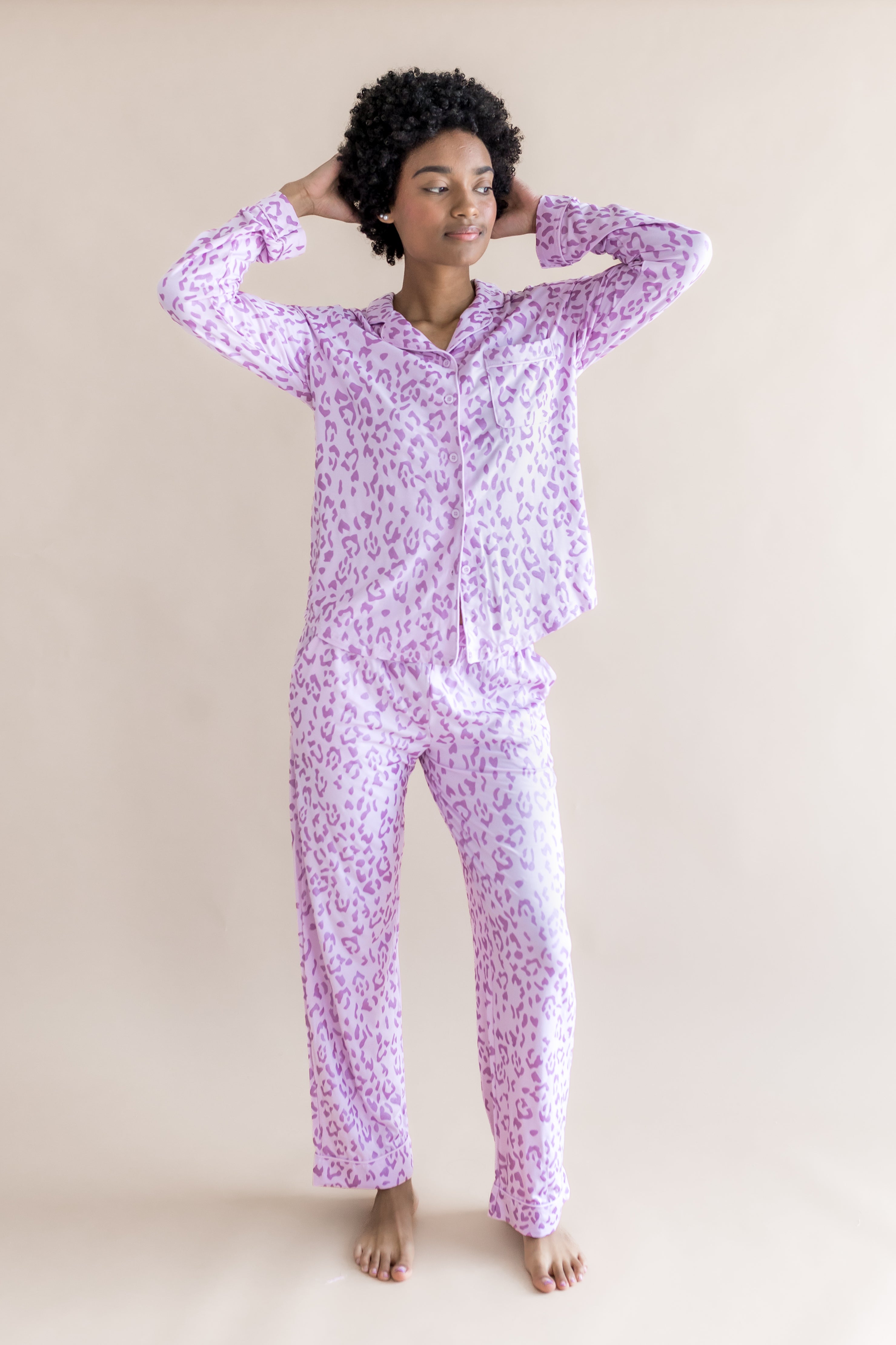 Model wearing Thistle Leopard print Women's Long Sleeve Pajama Set on a beige background
