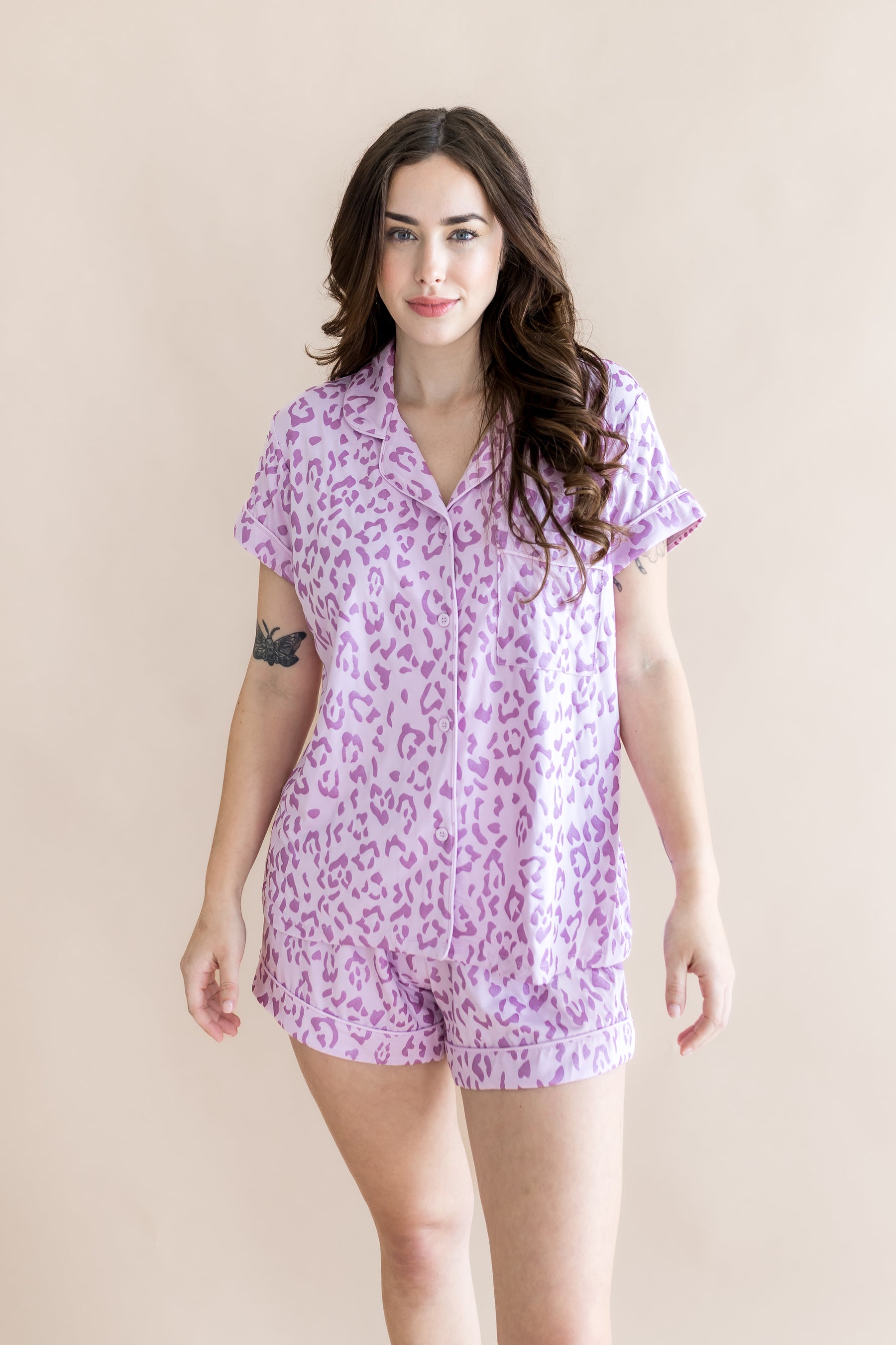 Model wearing Women's Short sleeve pajama set with Thistle Leopard print on a beige background