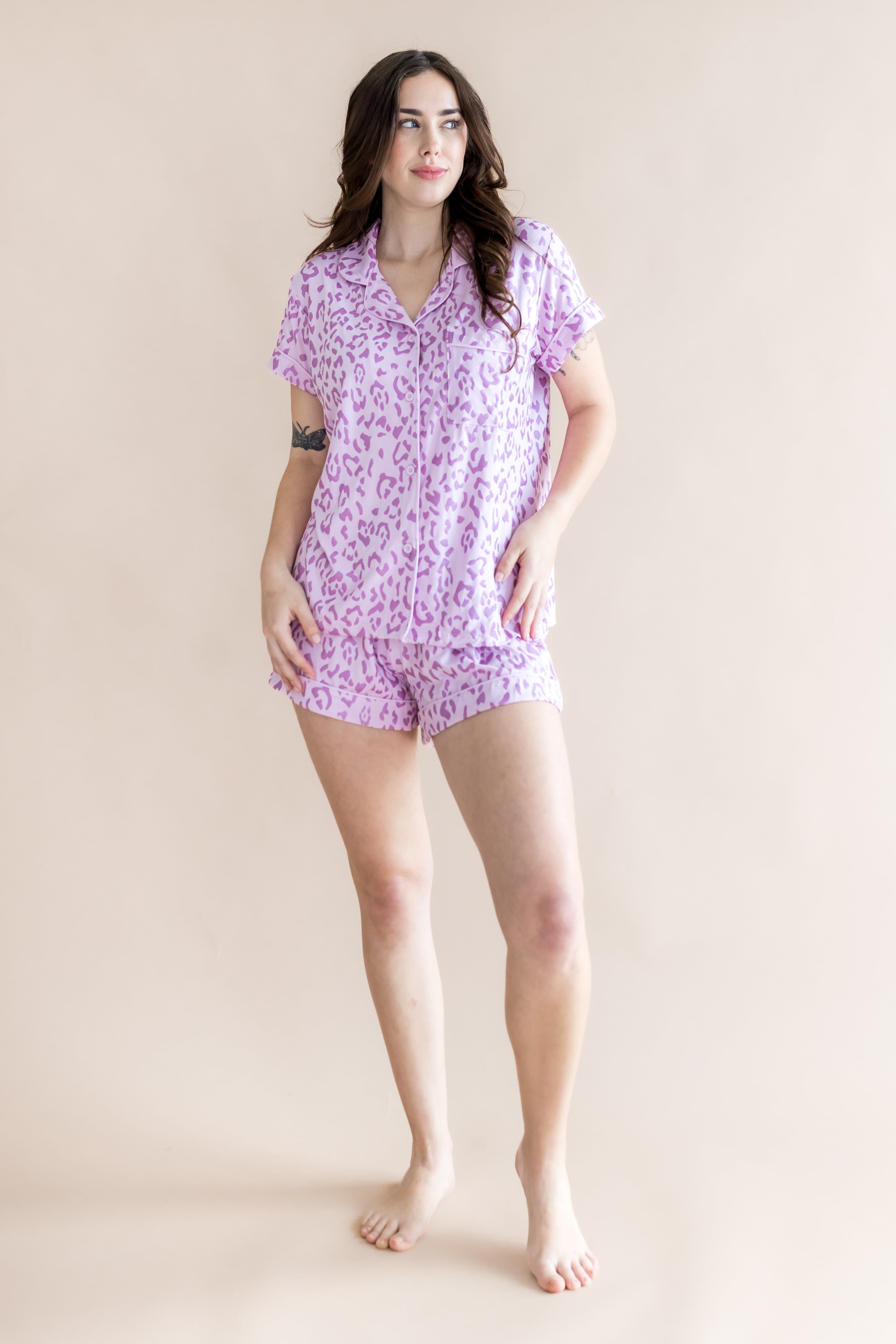 Model posing in Women's Short sleeve pajama set with Thistle Leopard print on a beige background