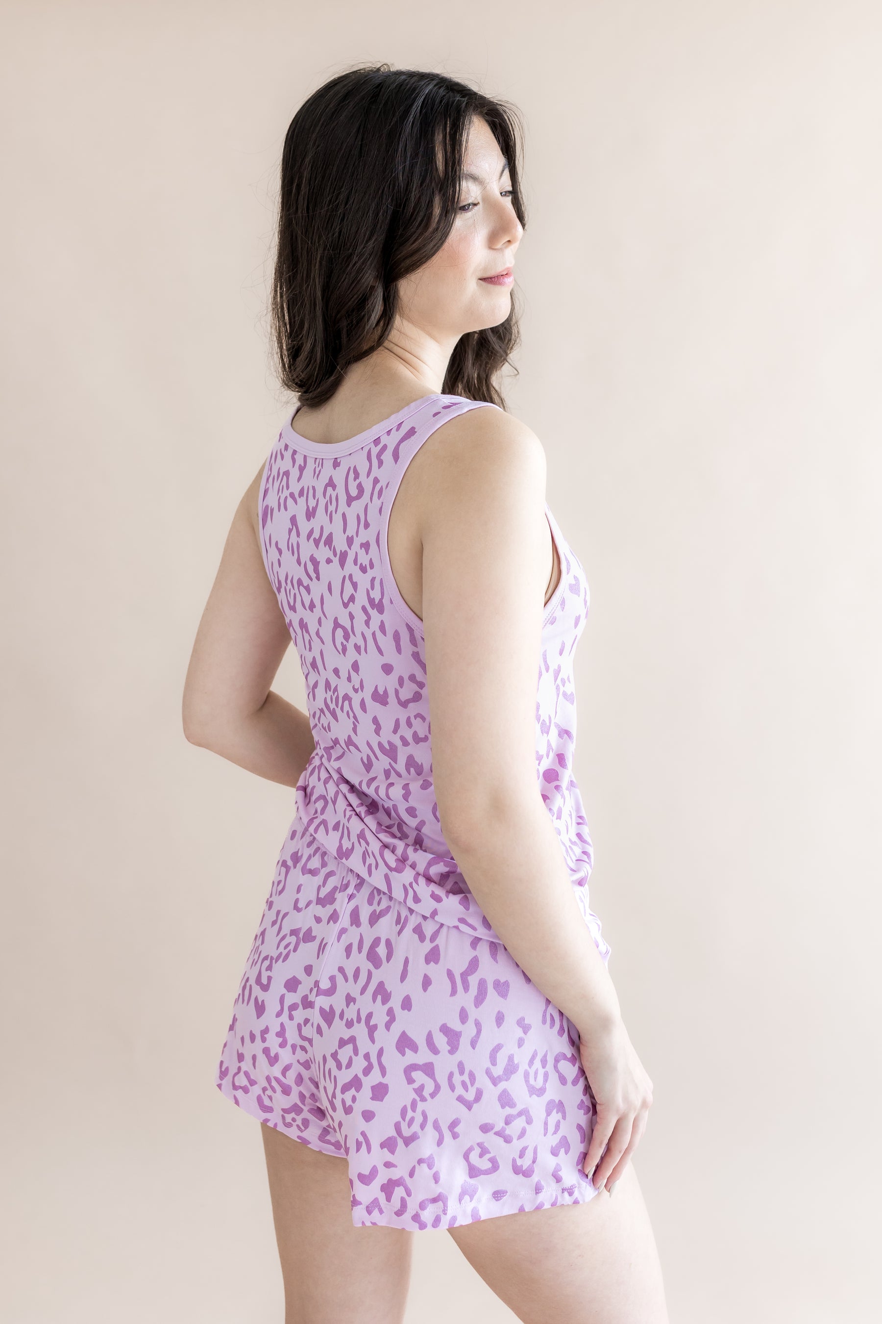 Back side of Women's Tank set in Thistle Leopard print on a beige background