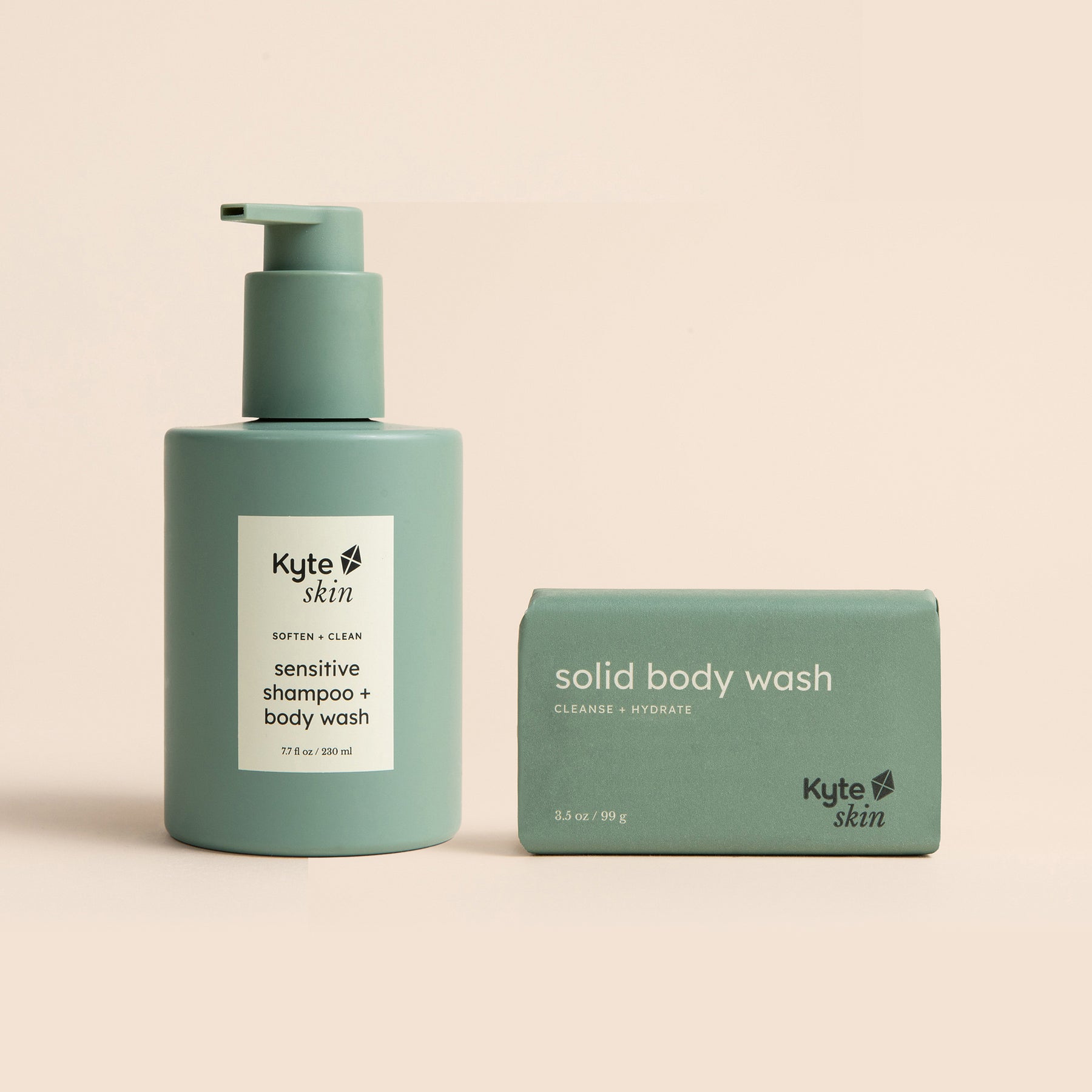 Kyte Skin shampoo and body wash bottle and bar on a beige background