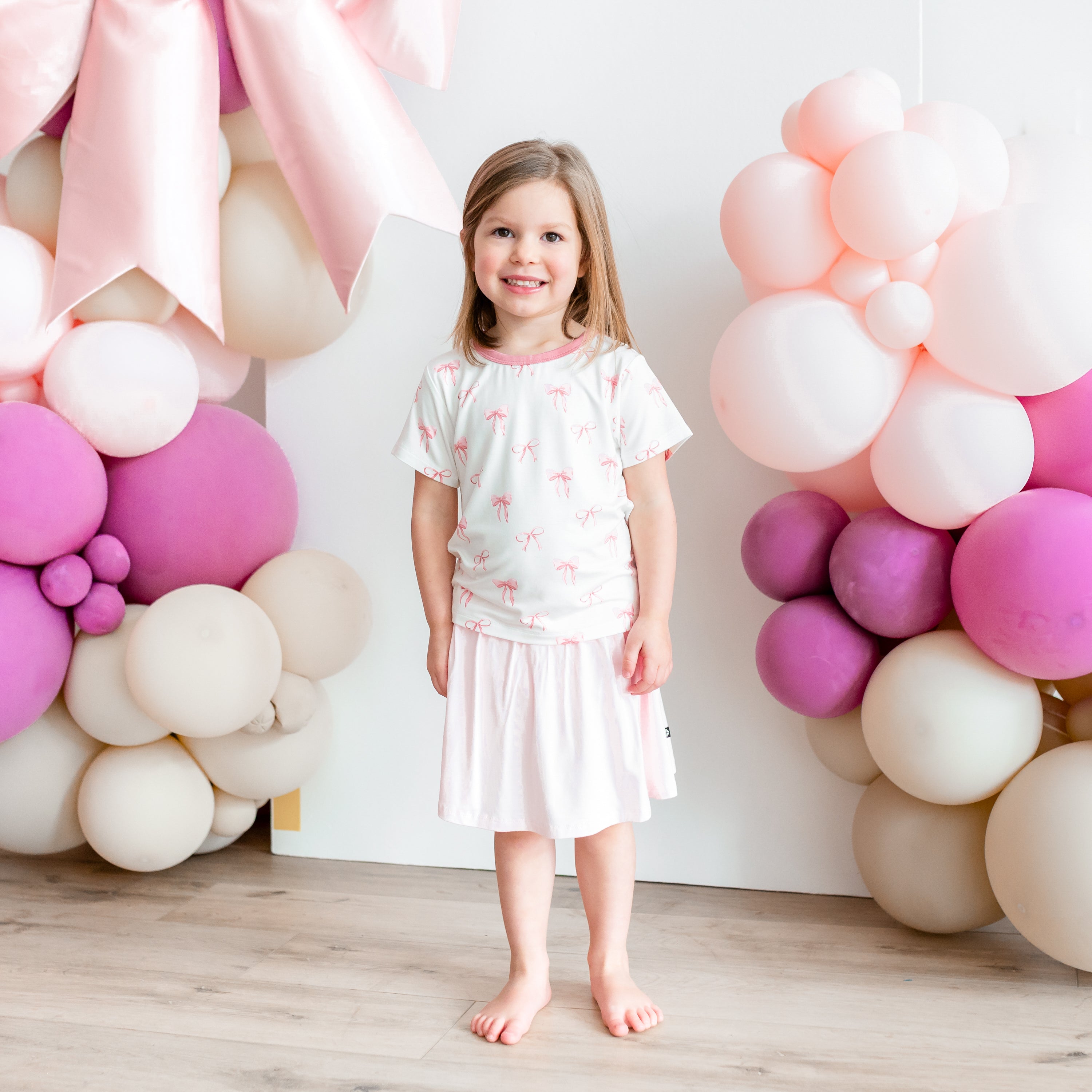 Child modeling Toddler Basic Tee in Bow and Sakura Skort