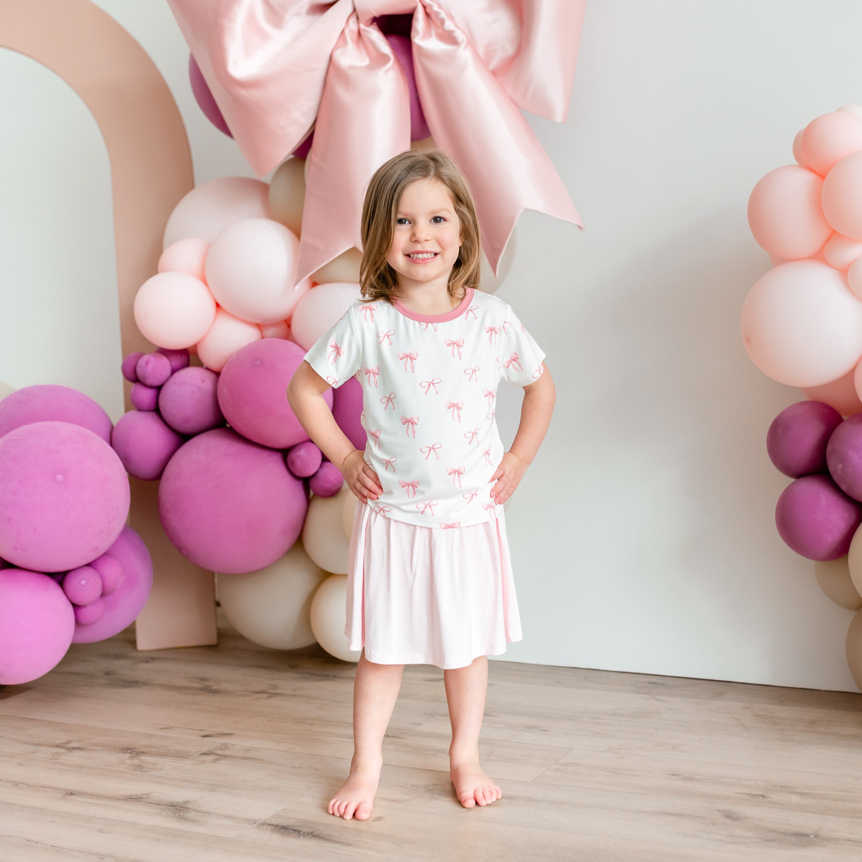 Child modeling Toddler Basic Tee in Bow and Sakura Skort