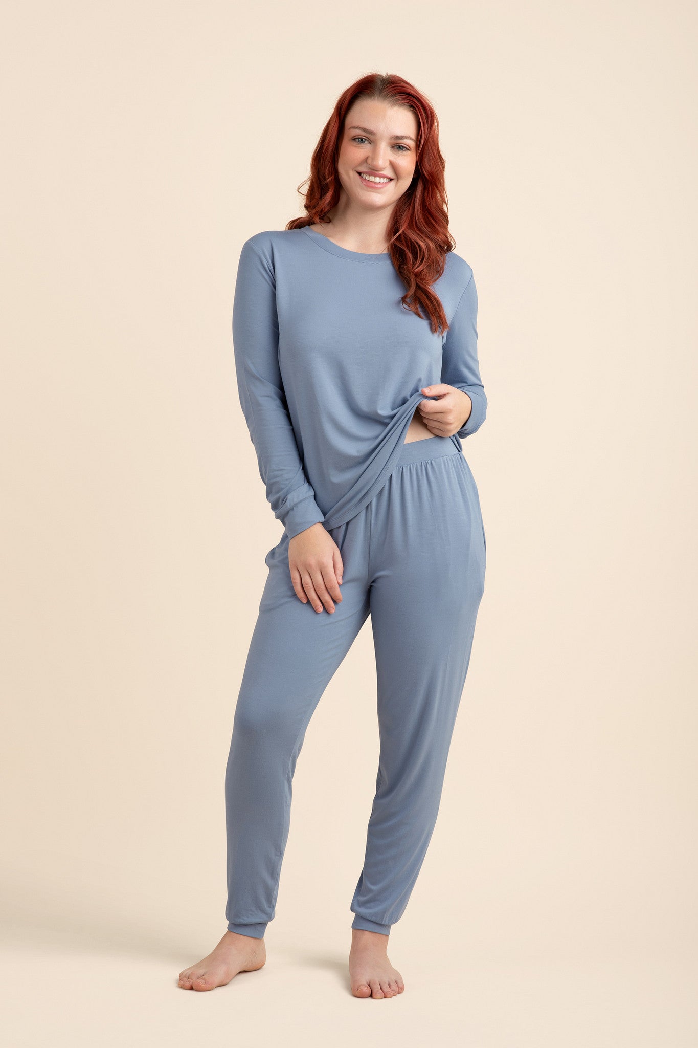 Woman wearing a slate blue matching set 