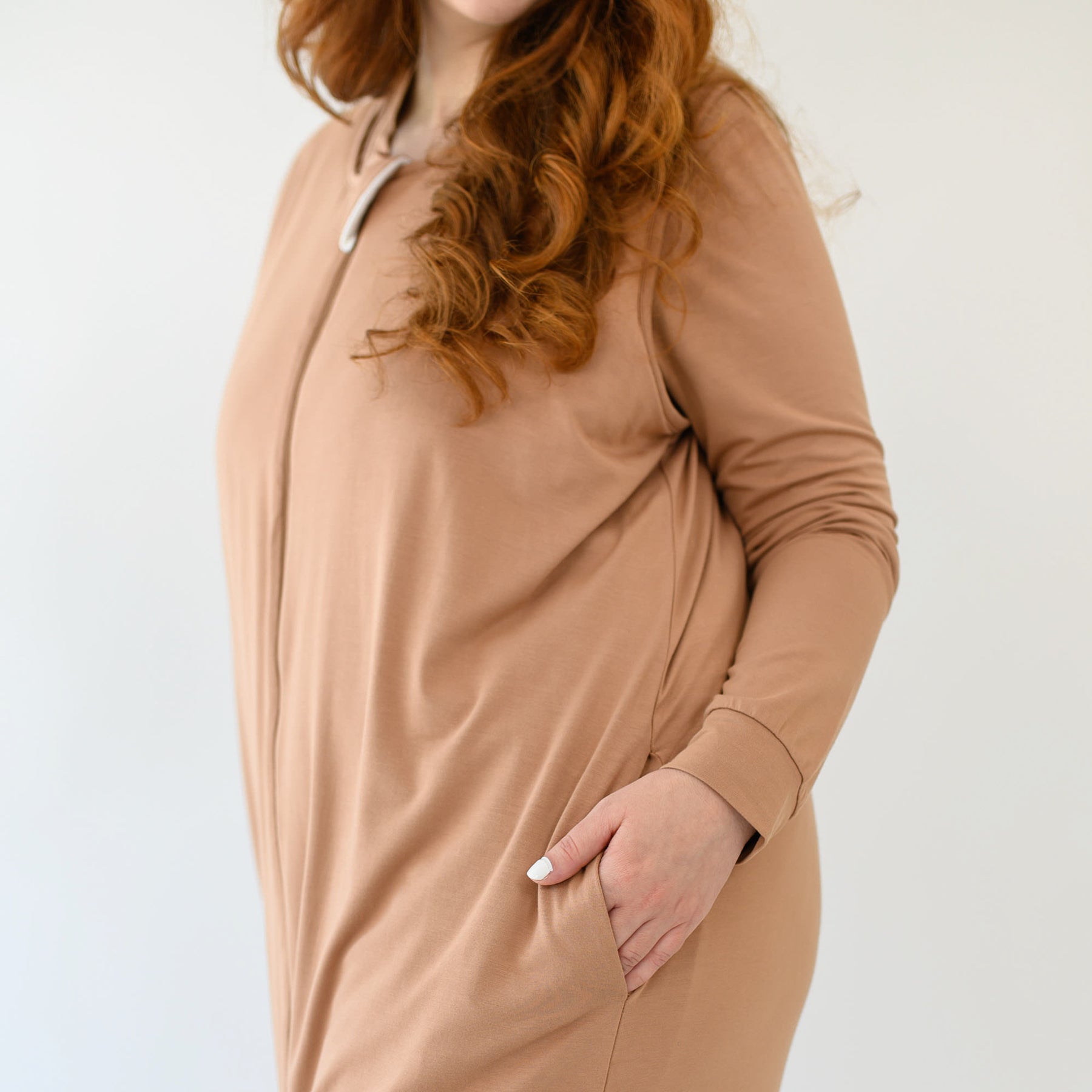 Close up of the pockets in the Adult Sleep Bag Walker in Latte