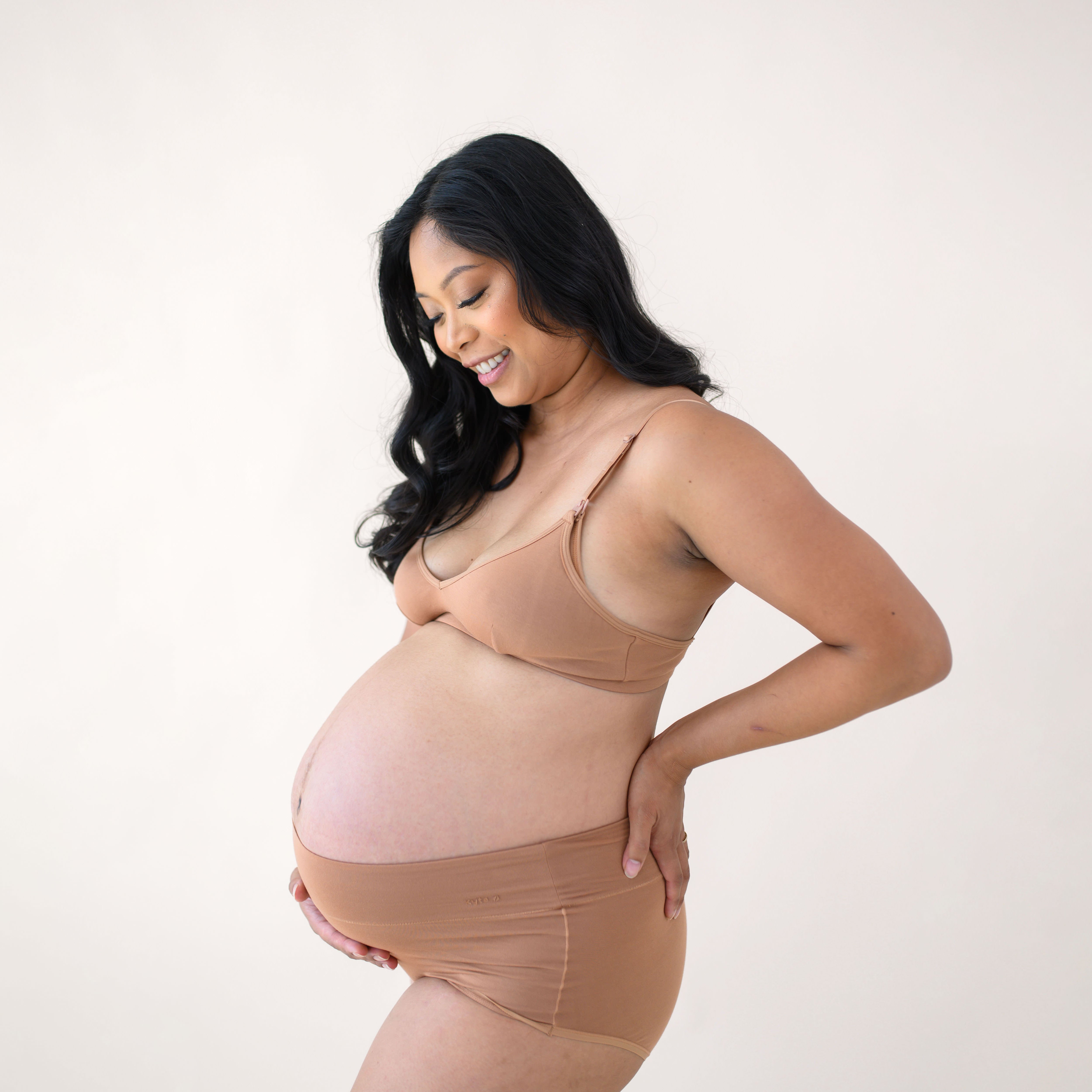 Woman modeling Women's High-Waisted Brief in Latte and nursing bra