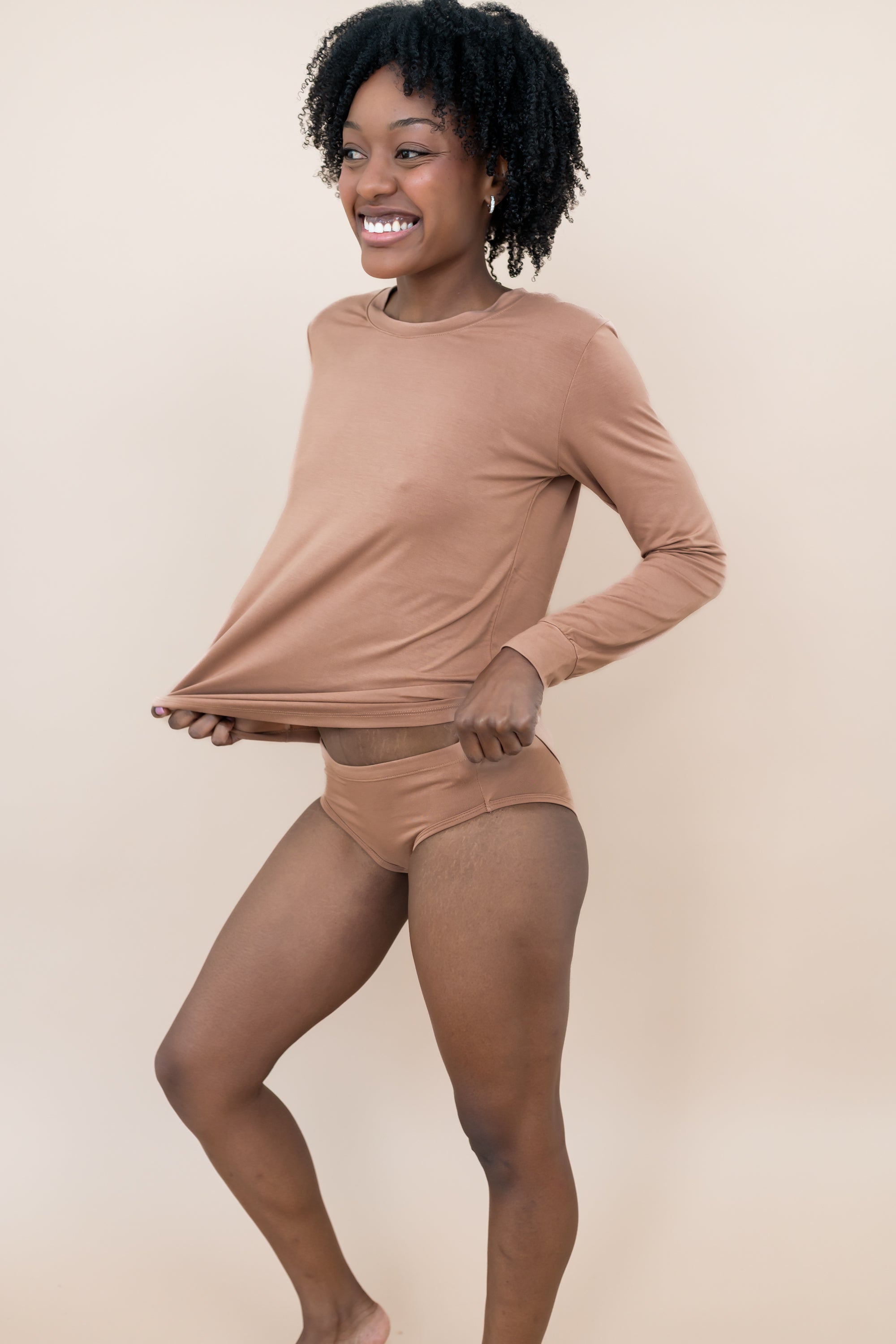 Female model wearing the Women’s Underwear in Latte paired with matching top from the women's jogger set