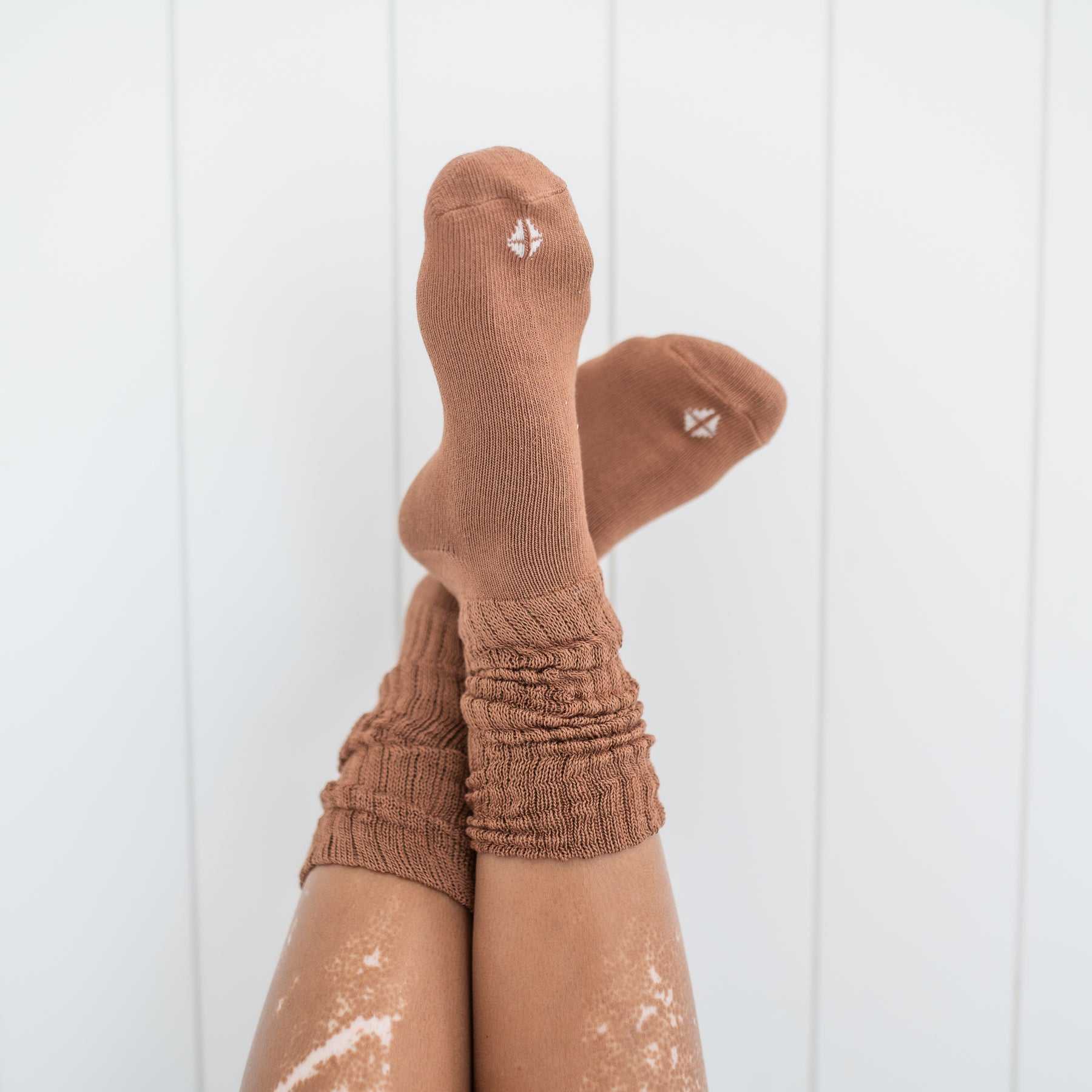 Adult Scrunch Socks in Latte shown on a model